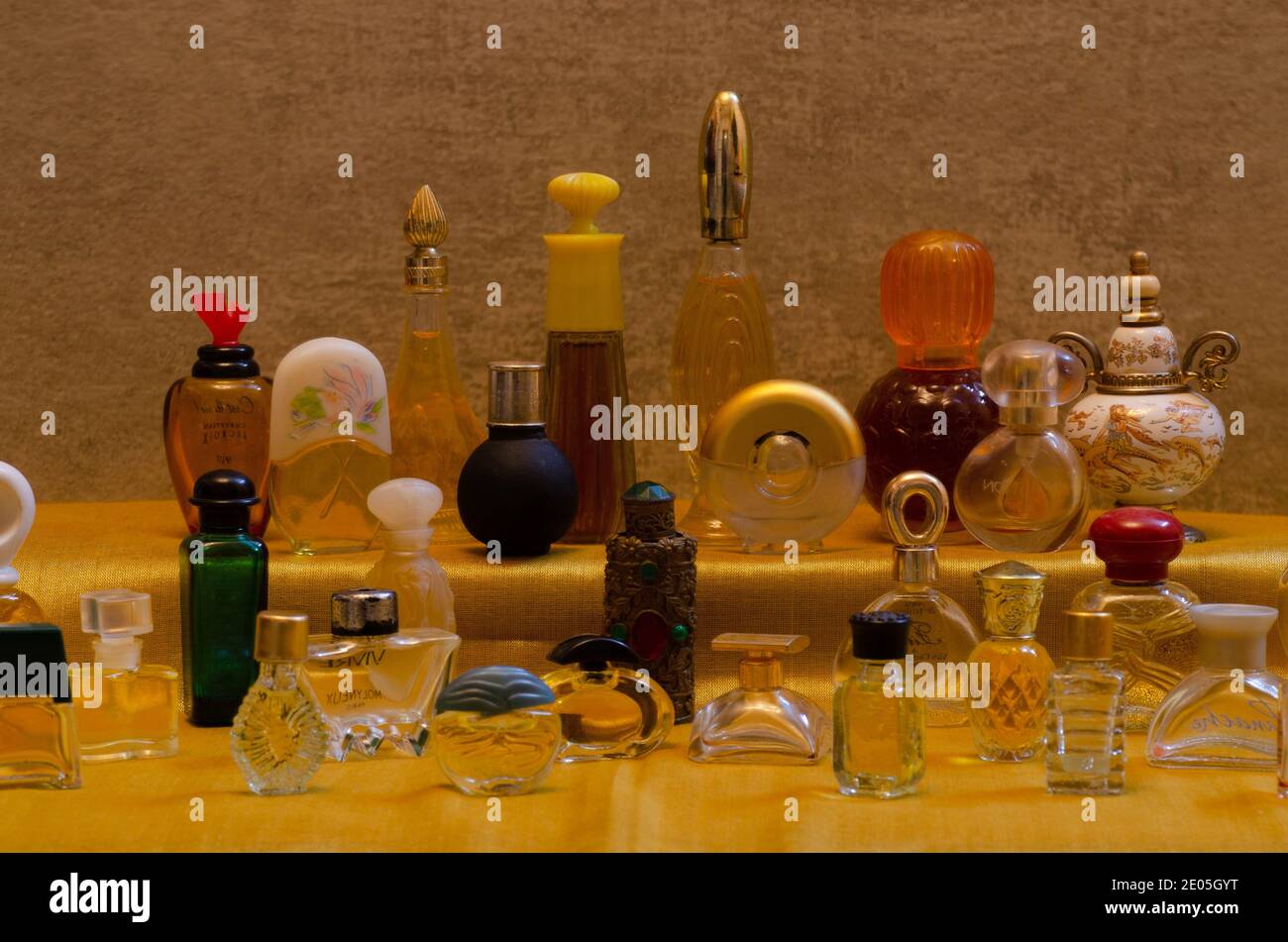 Vintage decorative small bottle of attar perfume or cologne on Black