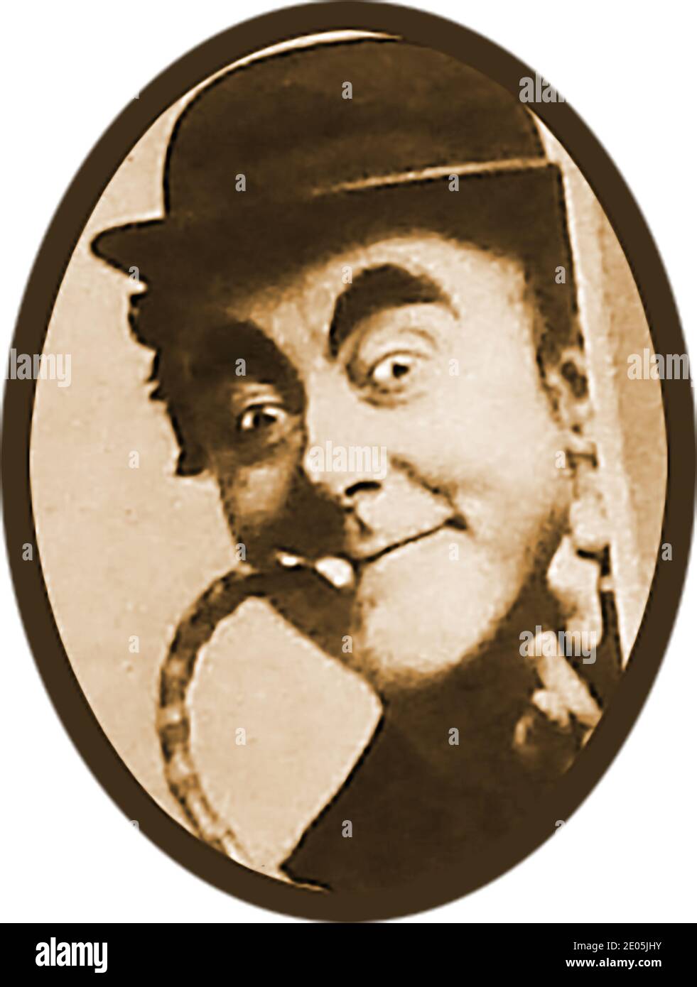 An old portrait photograph  of George Robey  who was known to his fans as 'The Prime Minister of Mirth' performing on radio . Robey  whose real name was Sir George Edward Wade, CBE (1869 –  1954),   was an English comedian, singer and actor in musical theatre. He was also one of the greatest  variety, music hall and pantomime  performers of the late 19th and early 20th centuries starring in the Royal Command Performance in 1912. In addition he was a semi-professional sportsman, playing cricket and football , starred   on stage in Shakespearean plays and had a modest success in film. Stock Photo