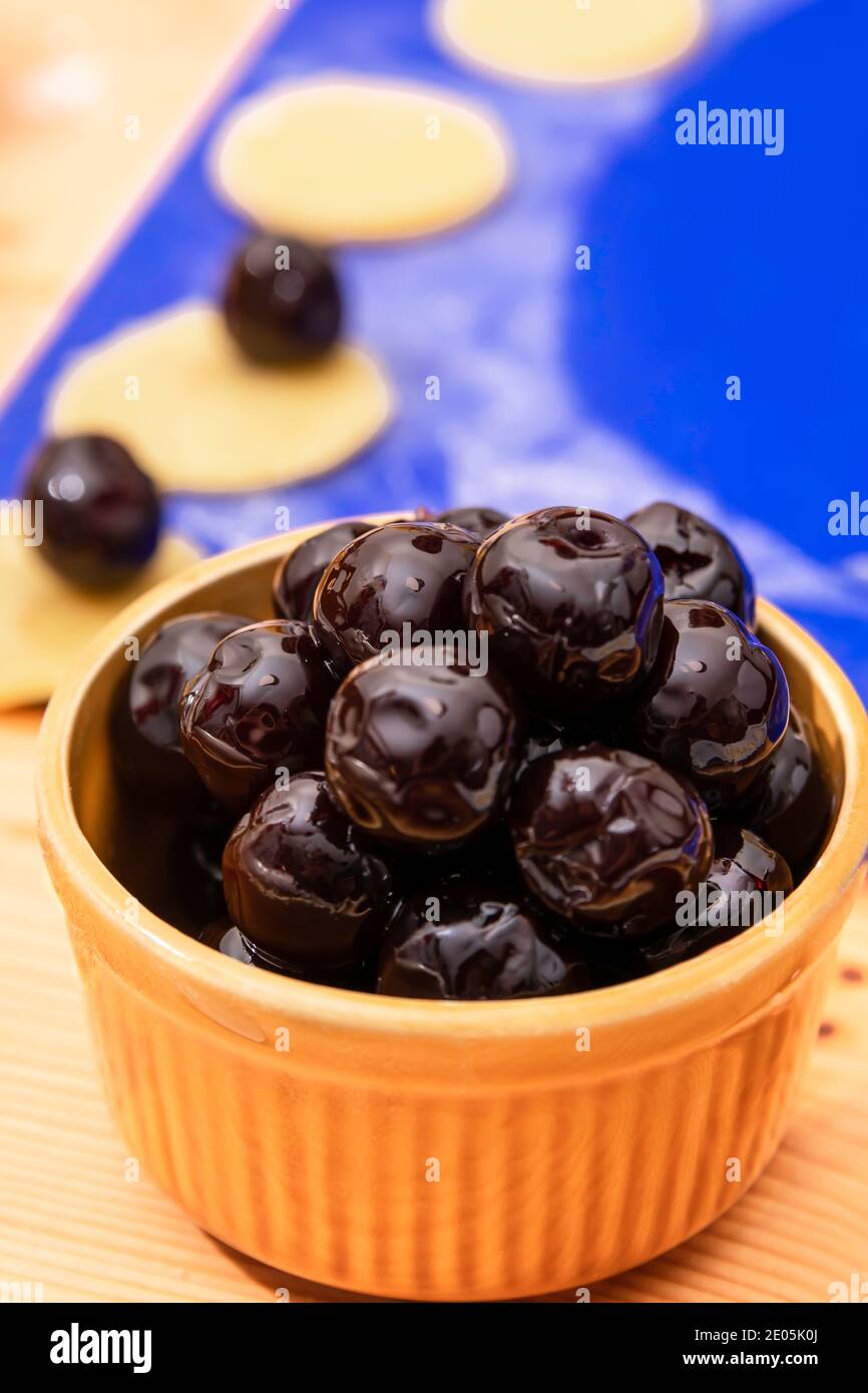Amarena Cherries Stored In A Yellow Cup Stock Photo