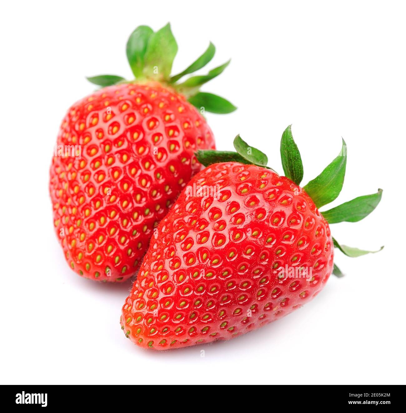Ripe strawberry with leaves on white background Stock Photo - Alamy