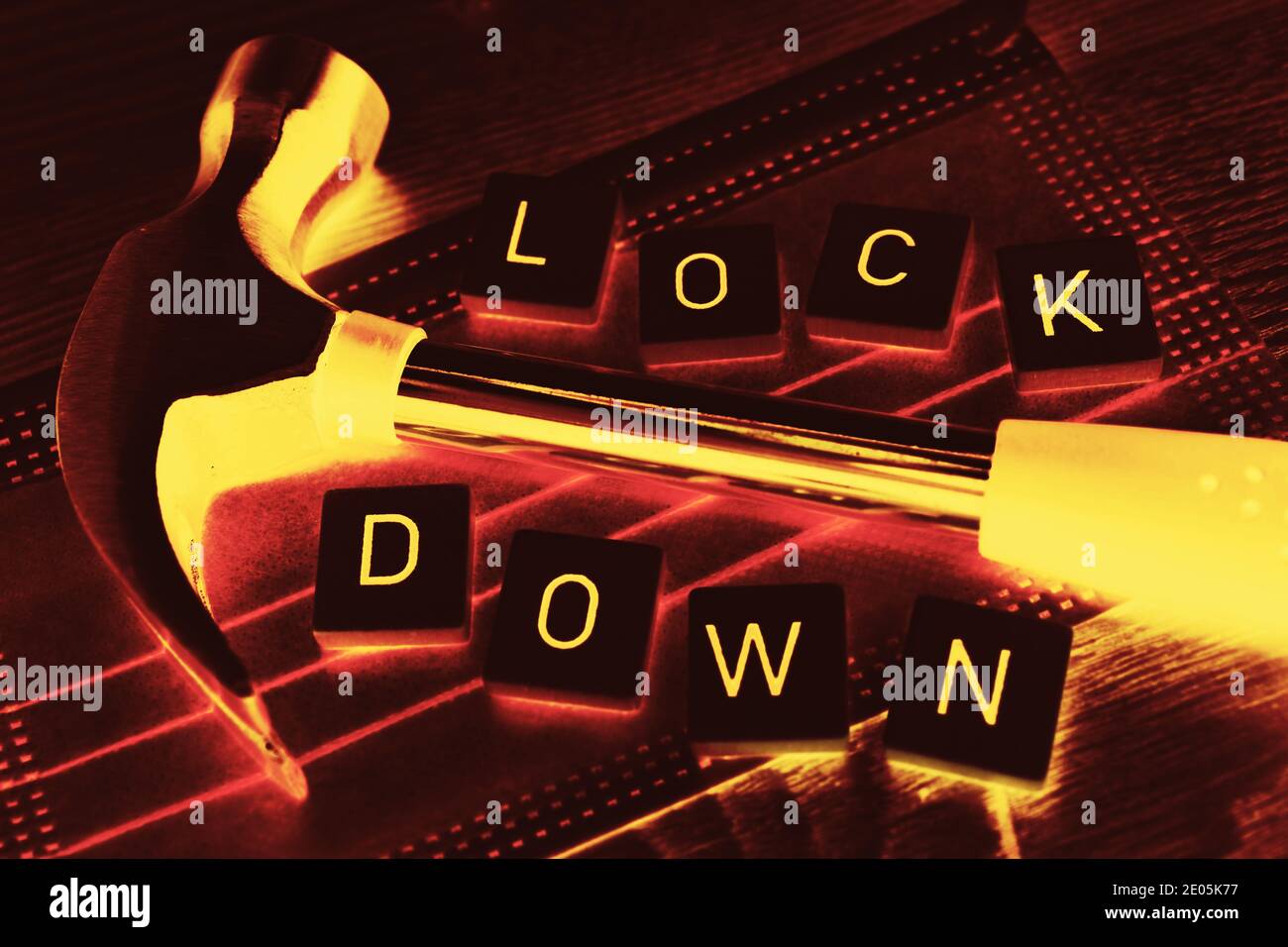 Hammer On Face Mask, Corona Lockdown Stock Photo