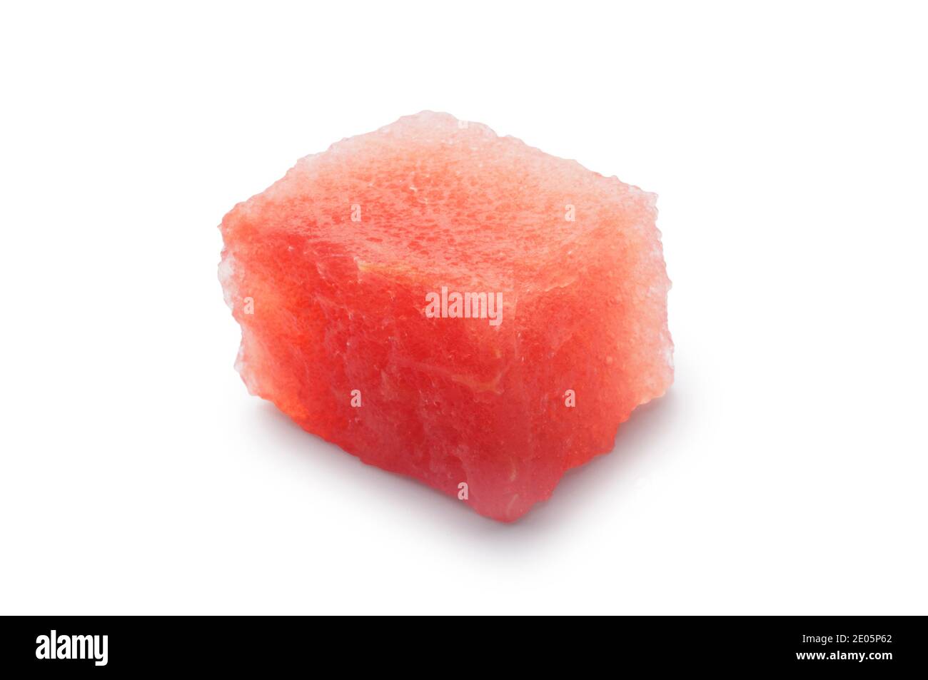 Studio shot of a small piece of water melon cut out against a white background - John Gollop Stock Photo