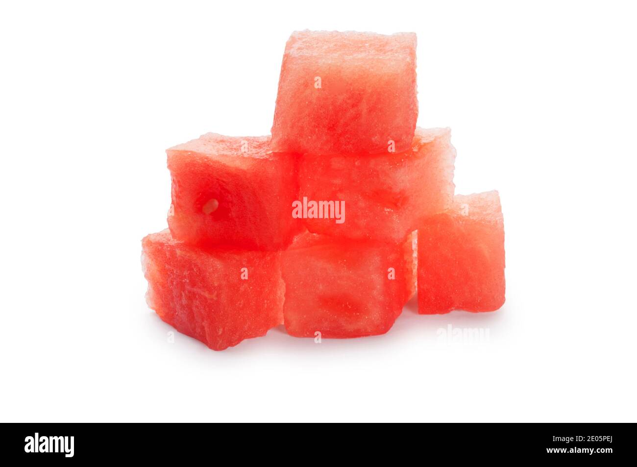 Studio shot of small pieces of water melon cut out against a white background - John Gollop Stock Photo