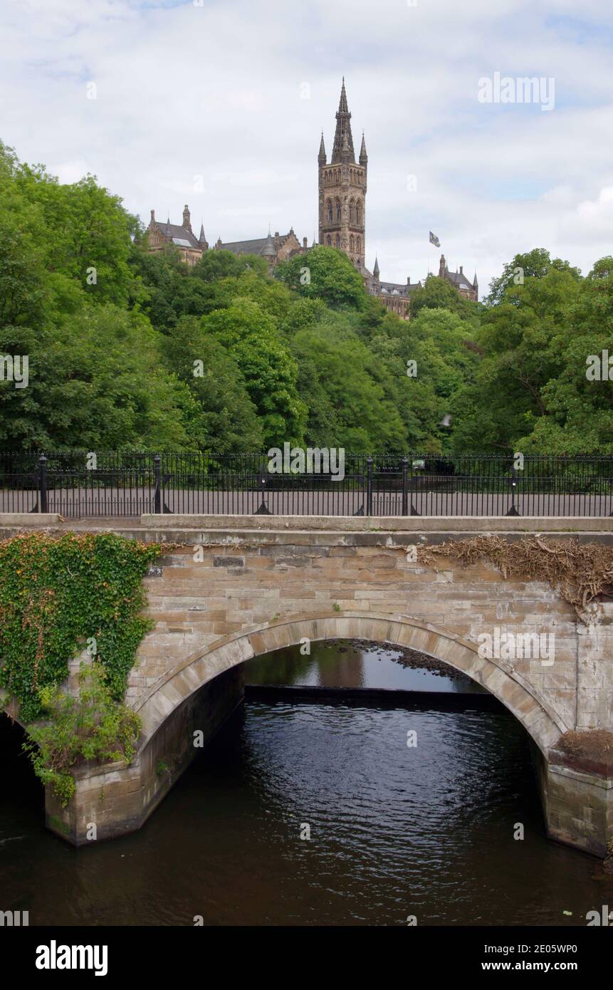 Snow Bridge over the River Kelvin and the University Bell Tower Glasgow Stock Photo