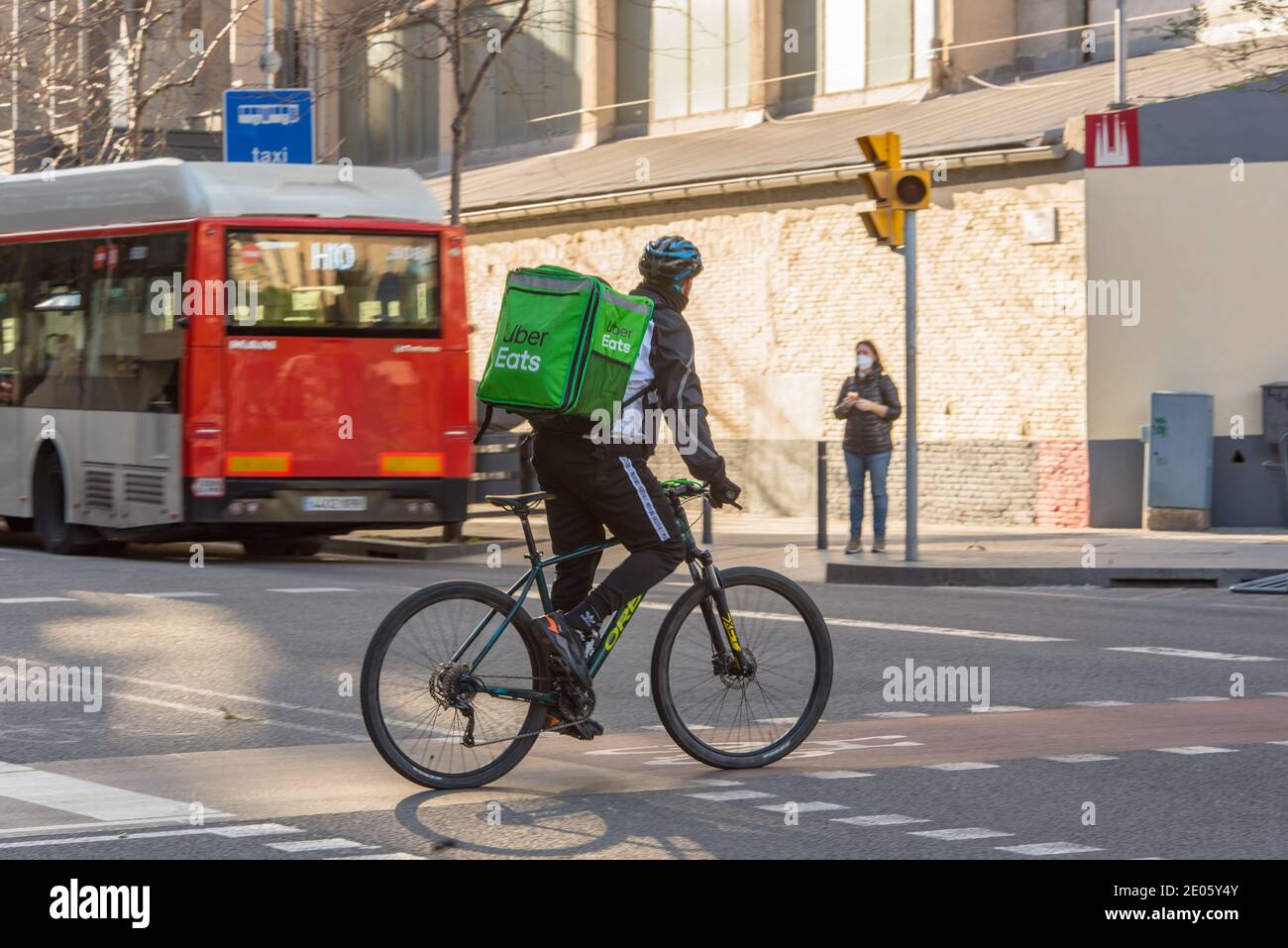 Barcelona, Spain: December 30 2020: Uber eats behind Basicila and 