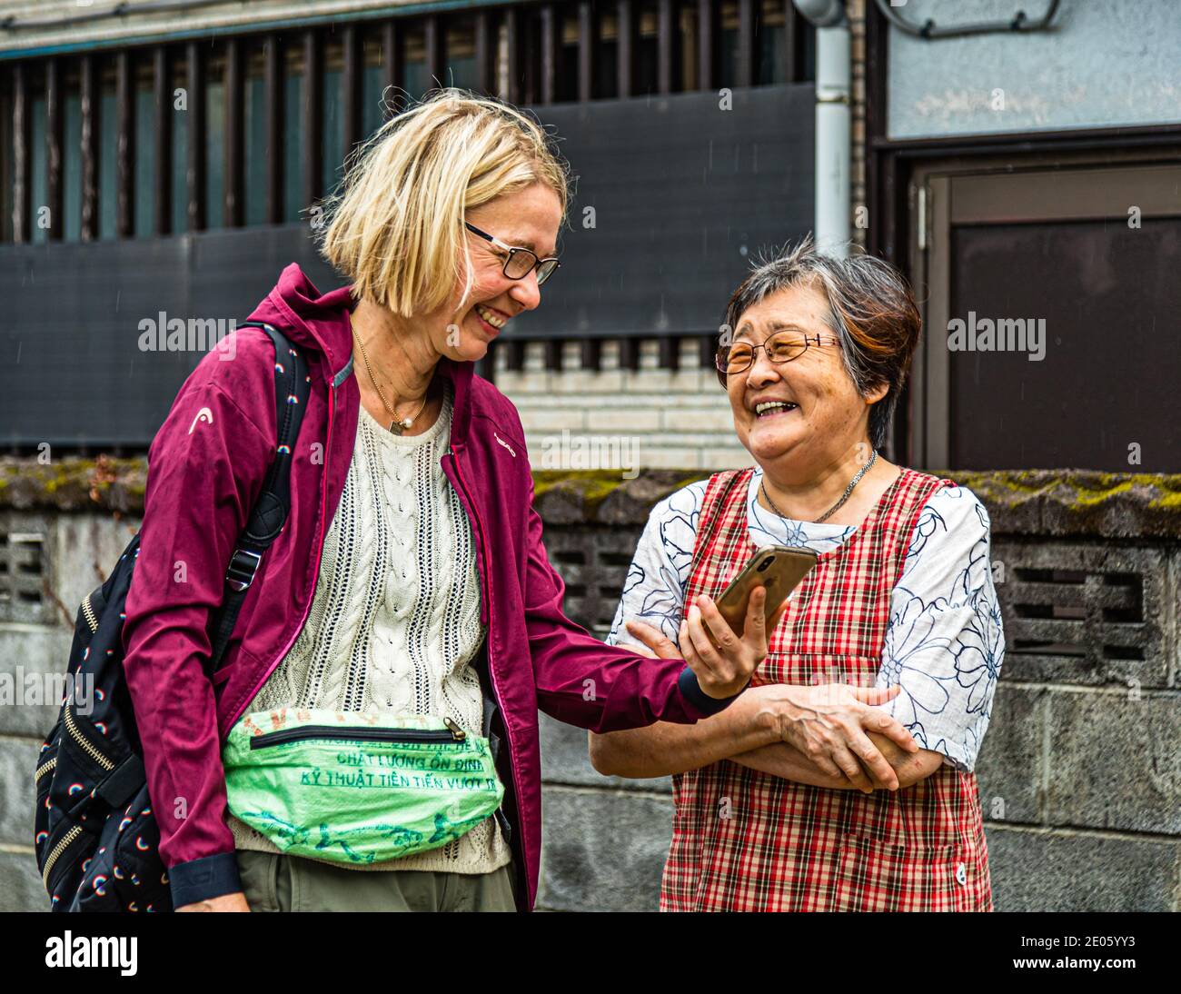 Woman clasped hands speaking hi-res stock photography and images - Alamy