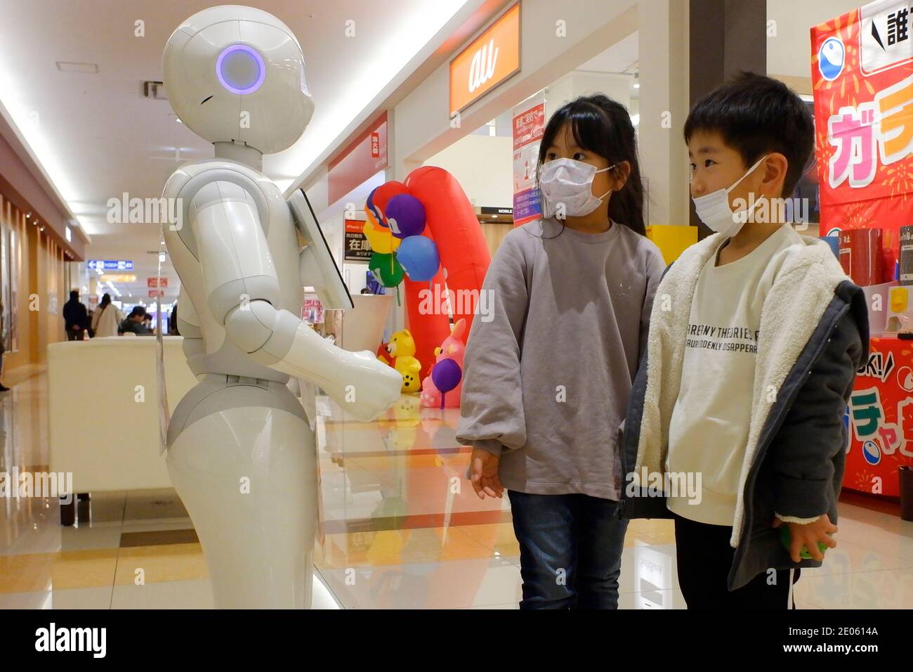 Tokyo, Japan. 30th Dec, 2020. A humanoid robot Pepper wearing a face mask is displayed as Tokyo Metrpolitan Government hires a hotel for the new accomodations of the patients of the new coronavirus with mild symptons in Tokyo.The Tokyo metropolitan government on Wednesday reported 944 new cases of the coronavirus, up 88 from Tuesday. The number is the result of 2,084 tests conducted on Dec 27. (Photo by Michele Sawada/Sipa USA) Credit: Sipa USA/Alamy Live News Stock Photo