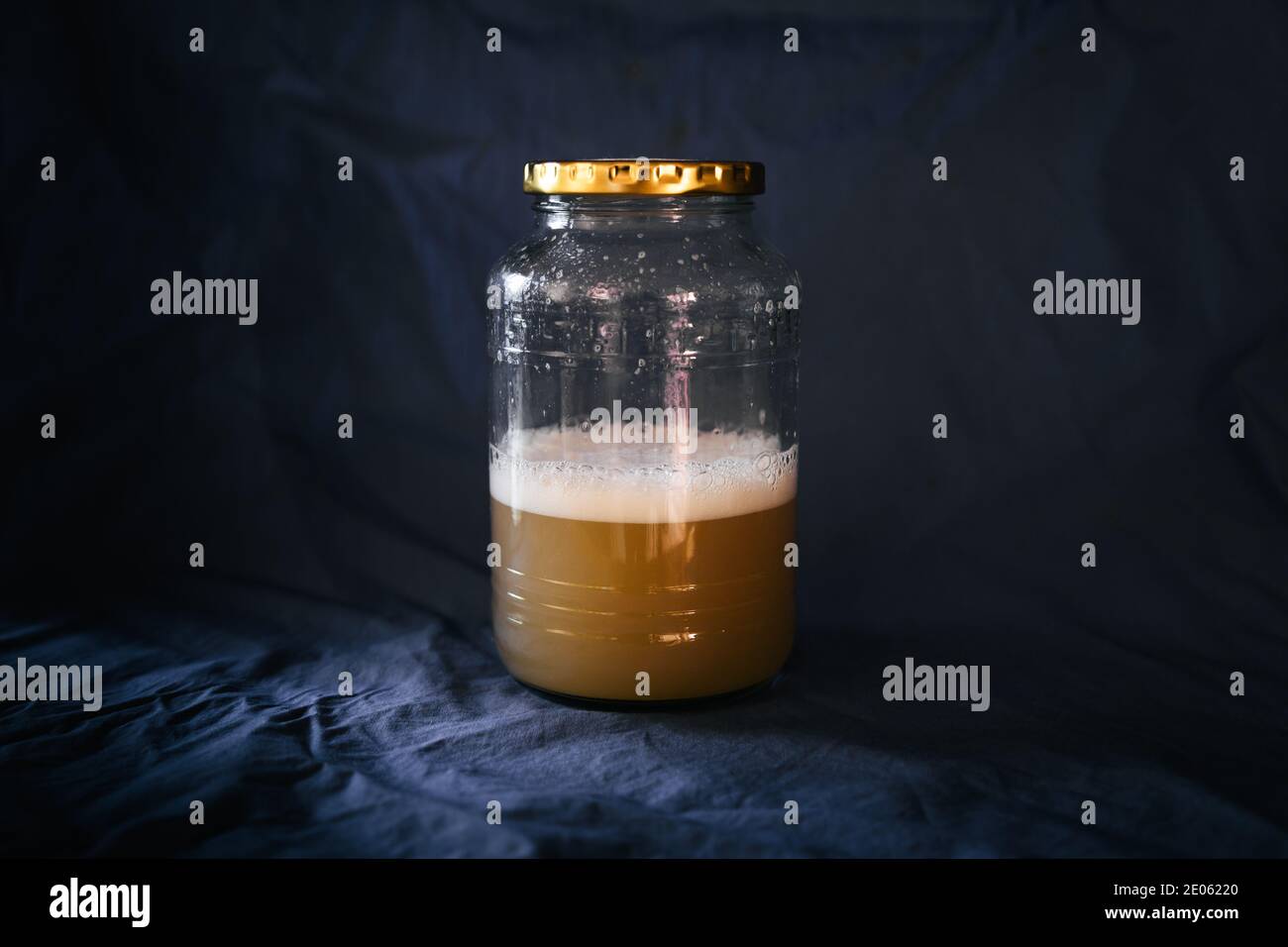 Homemade banana fruit wild natural yeast water with bubbles, active and