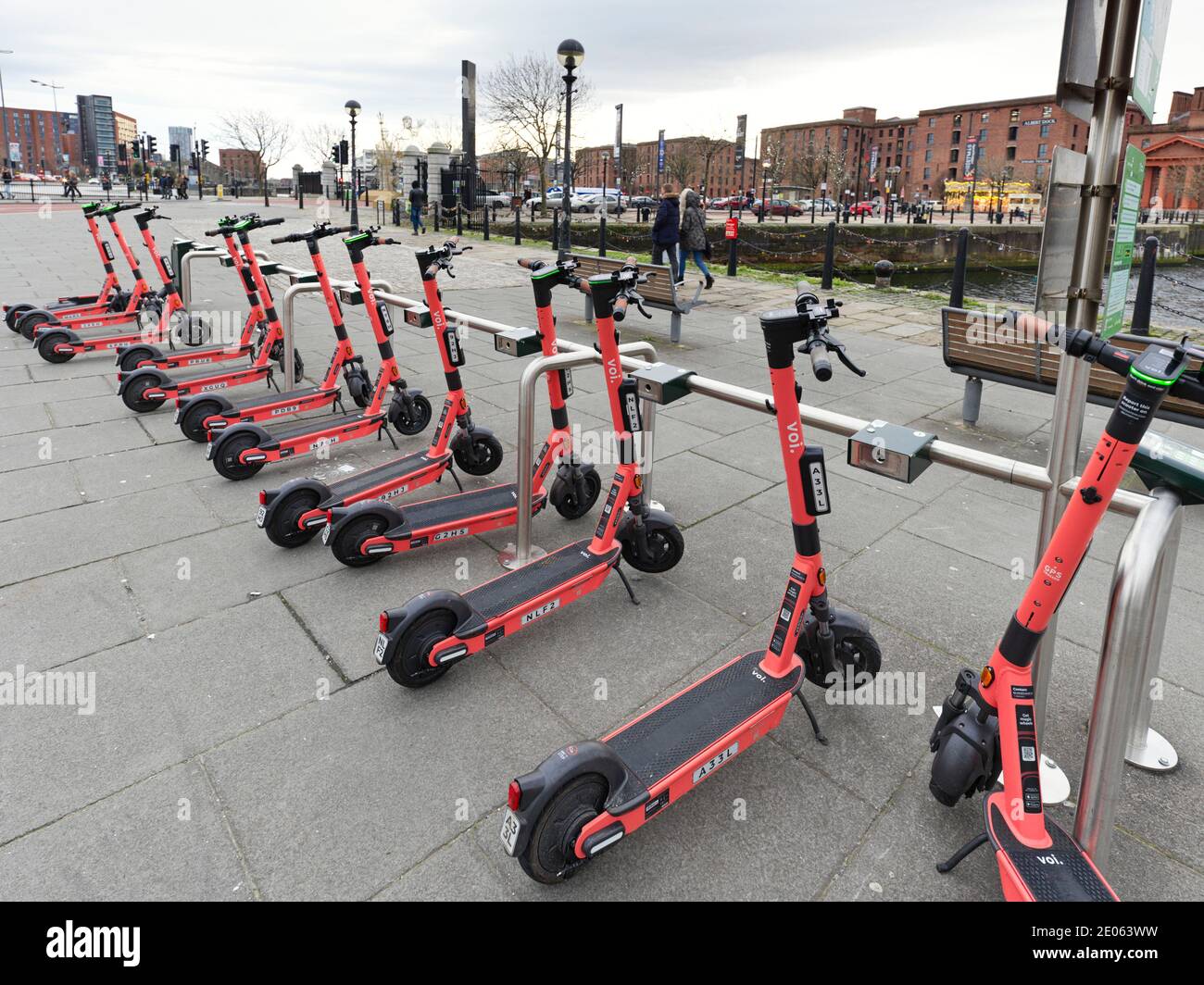 Voi hire scooters at Albert Dock docking station in Liverpool Stock Photo