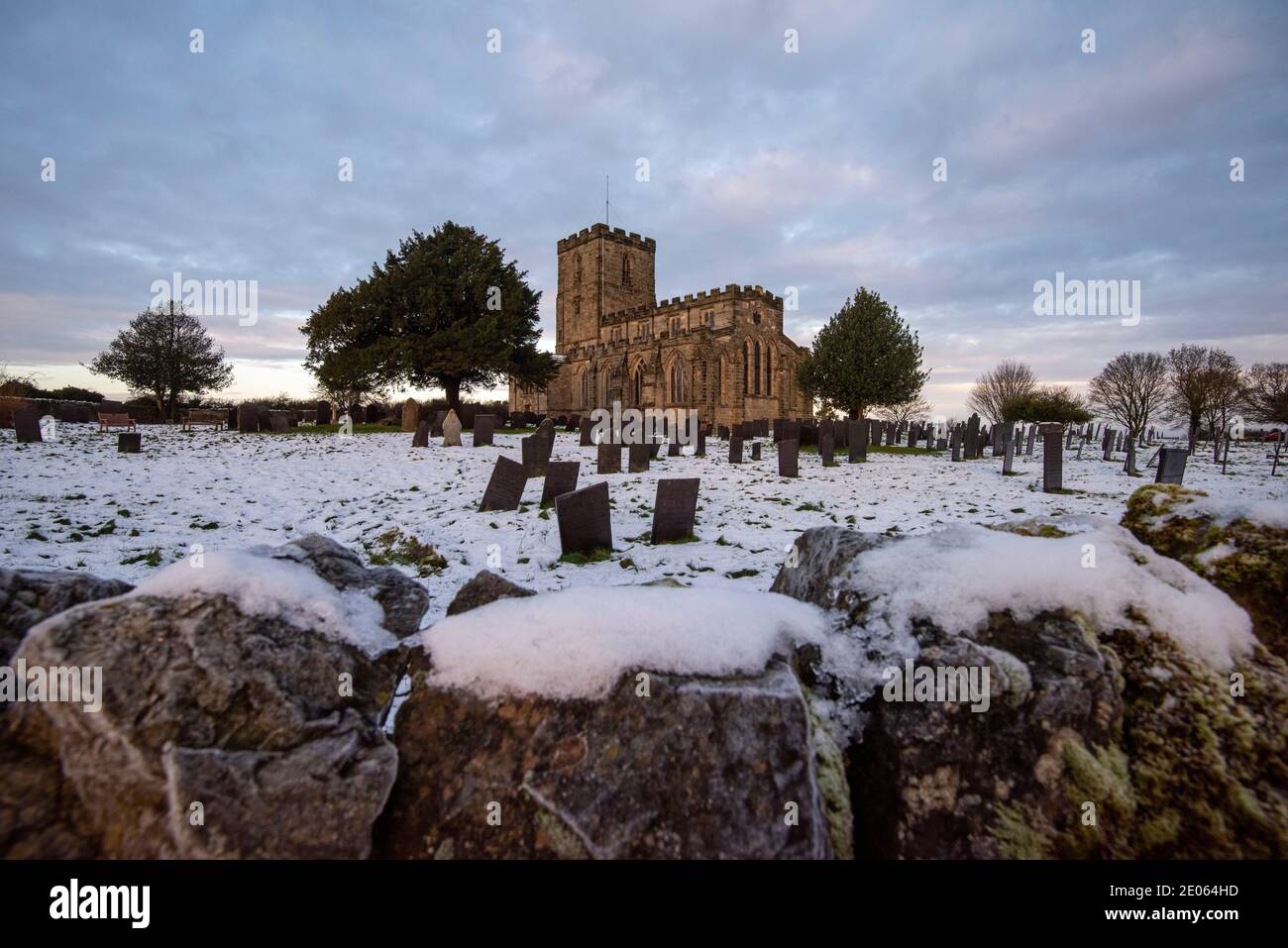 Snow on a winter morning at The Priory Church of Saint Mary and Saint Hardulph at Breedon on the Hill Leicestershire, England UK Stock Photo