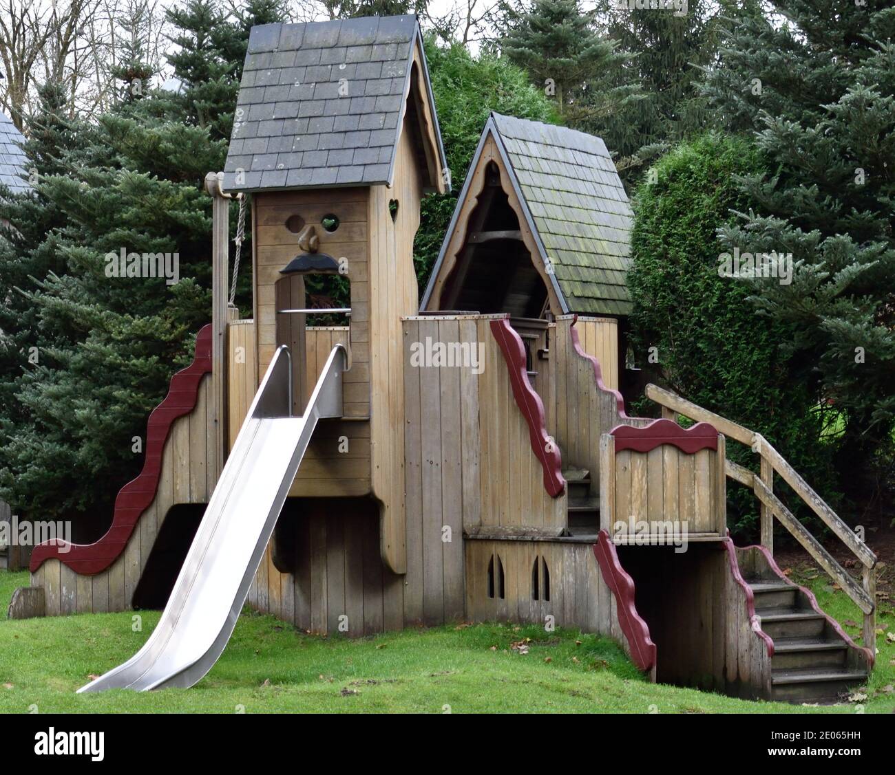 Wooden play castle in a woodland setting Stock Photo