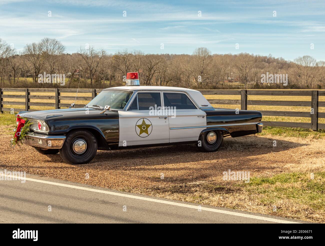 Old Classic police car with a Christmas wreath in Leipers Fork, Tennessee Stock Photo