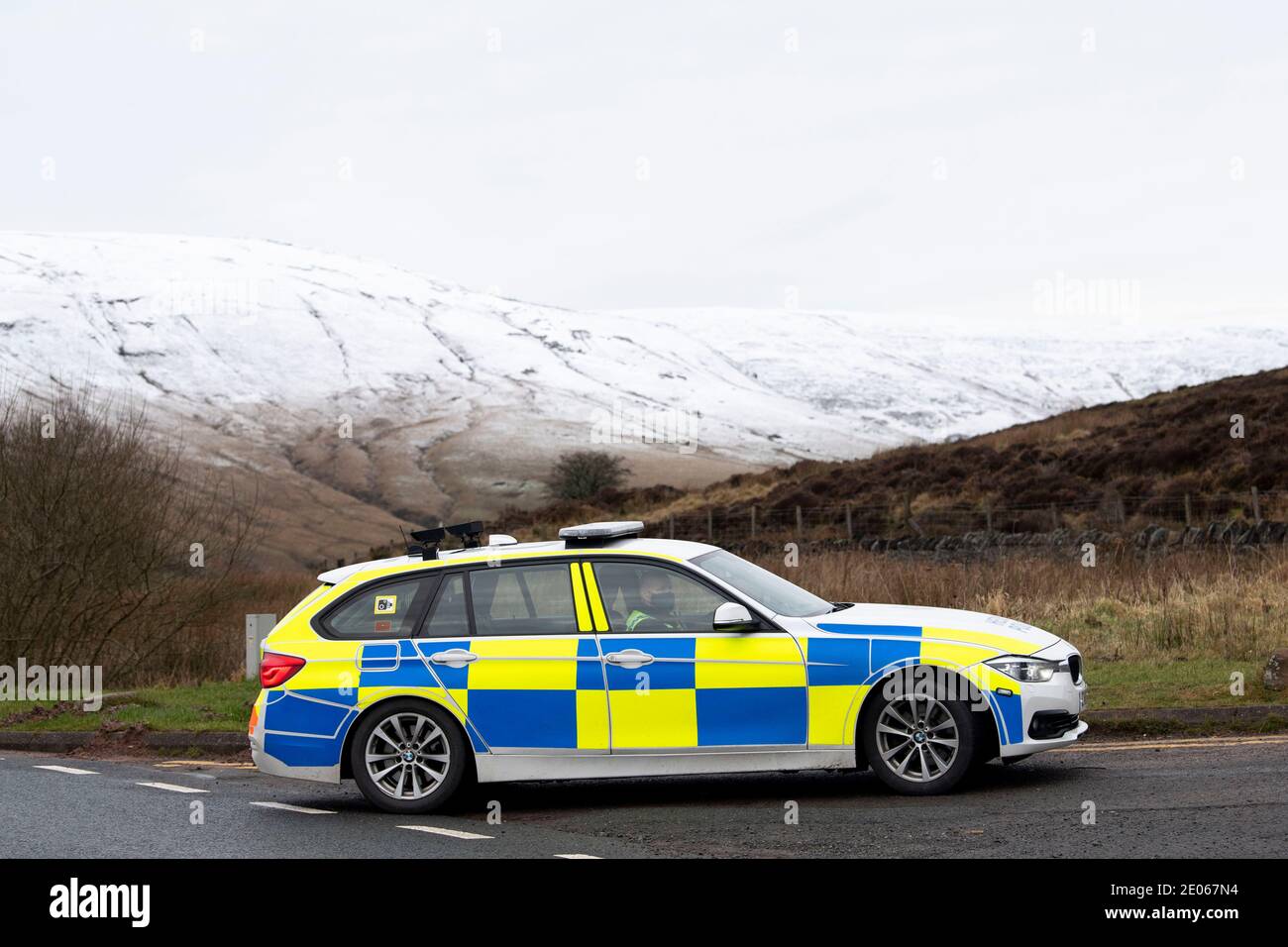 BRECON, WALES - DECEMBER 30: A police car at Storey Arms on December 30, 2020 in Brecon, Wales. Wales went into a Level 4 lockdown from midnight on De Stock Photo