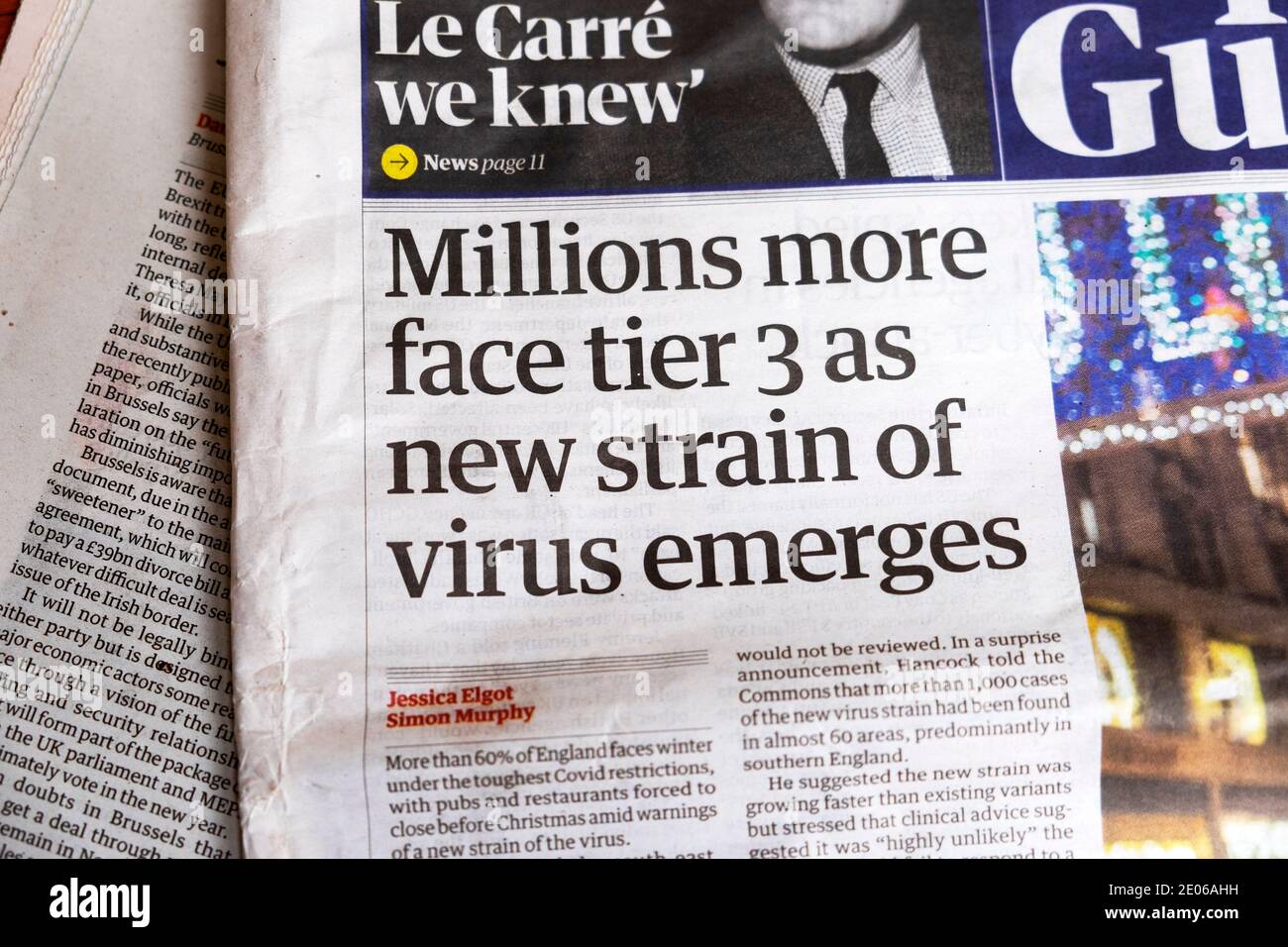 Guardian front page newspaper headline 'Millions more face tier 3 as new strain of virus emerges' London England UK 14 December 2020 Stock Photo