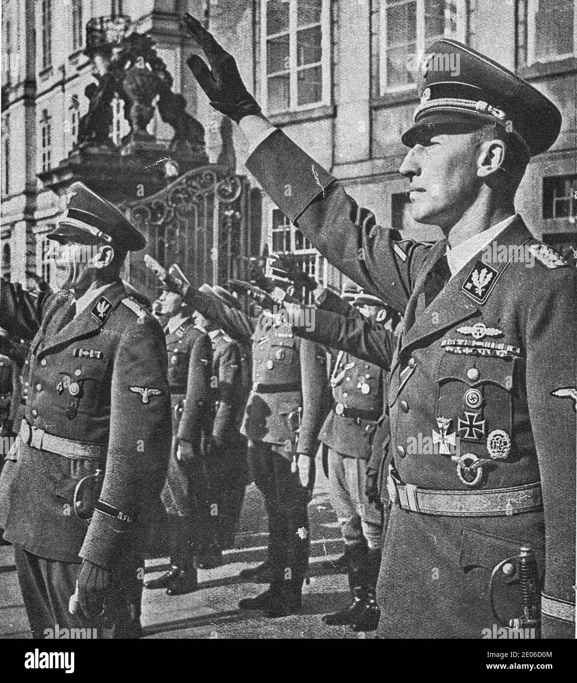 PRAGUE, PROTECTORATE OF BOHEMIA AND MORAVIA - SEPTEMBER 28, 1941: Reinhard Heydrich (right) and K.H. Frank at Prague castle. Nazis salute. Stock Photo