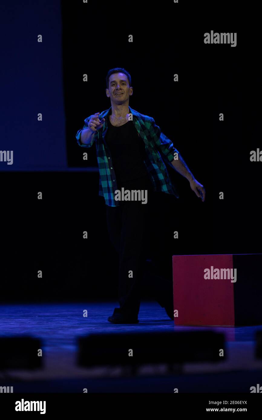 Actor dancer young man performs in the theater on stage in a dance ...
