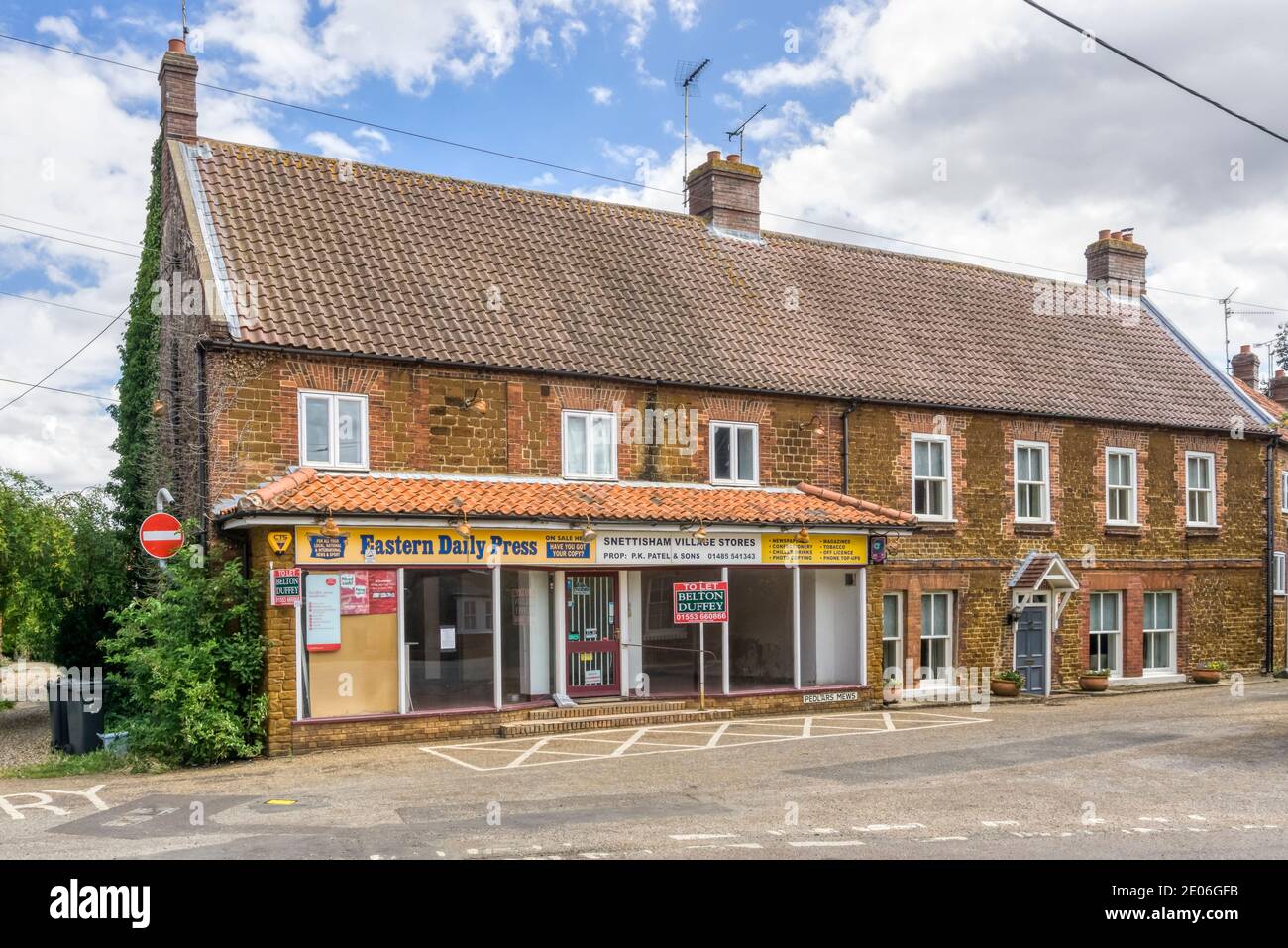 Closed & empty Snettisham Village Stores with a To Let sign outside. Stock Photo