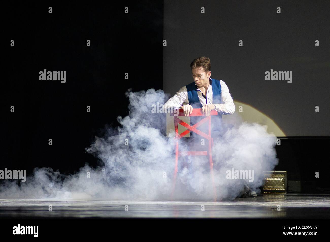 Actor dancer young man performs in the theater on stage in a retro ...