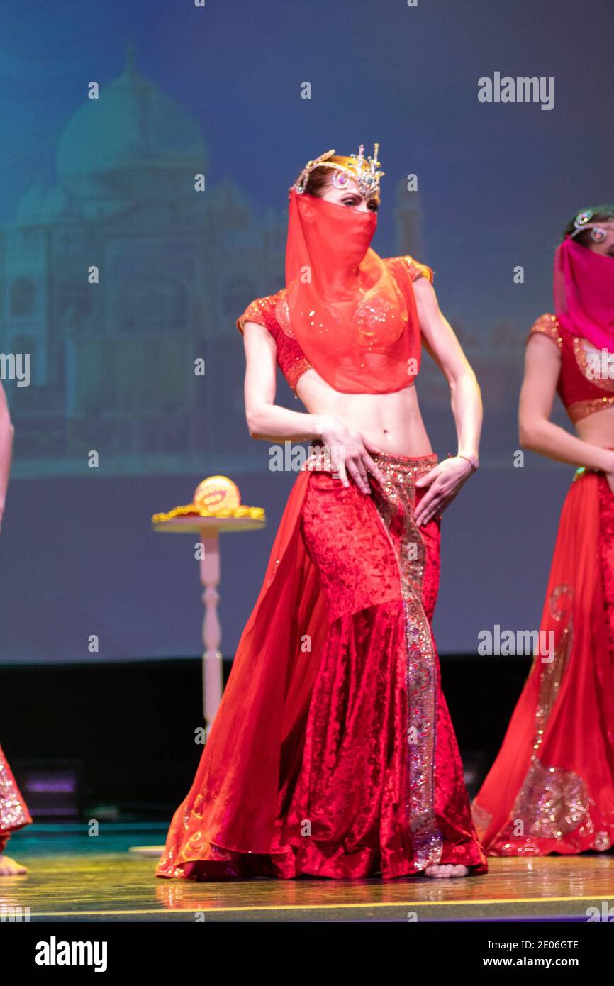 Dancers actors in Oriental Bellydance costumes perform in theater on ...