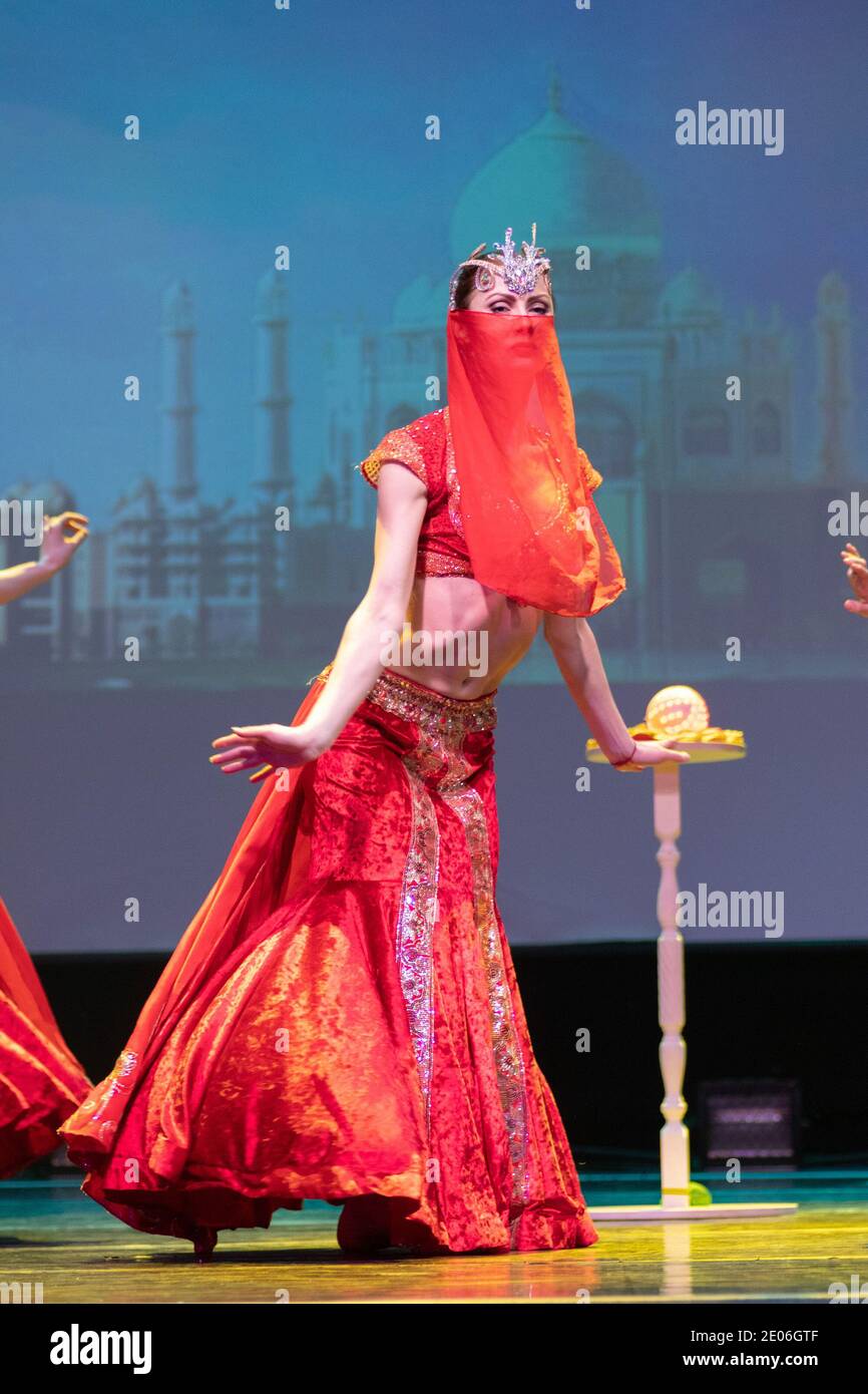 Dancers actors in Oriental Bellydance costumes perform in theater on ...