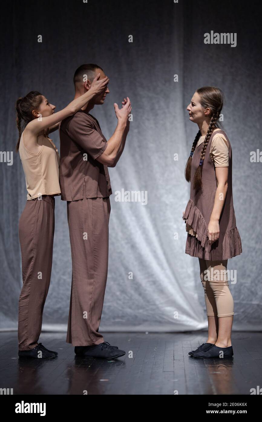 Actors and actresses play a modern lyrical performance of the theater ...