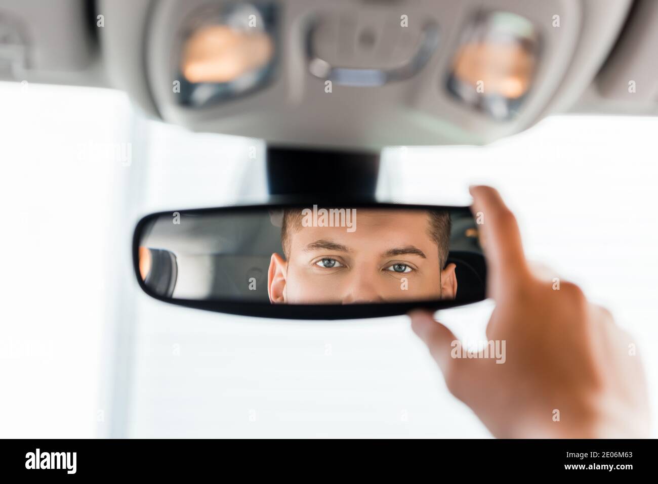 Reflection man adjusting mirror in hi-res stock photography and images ...