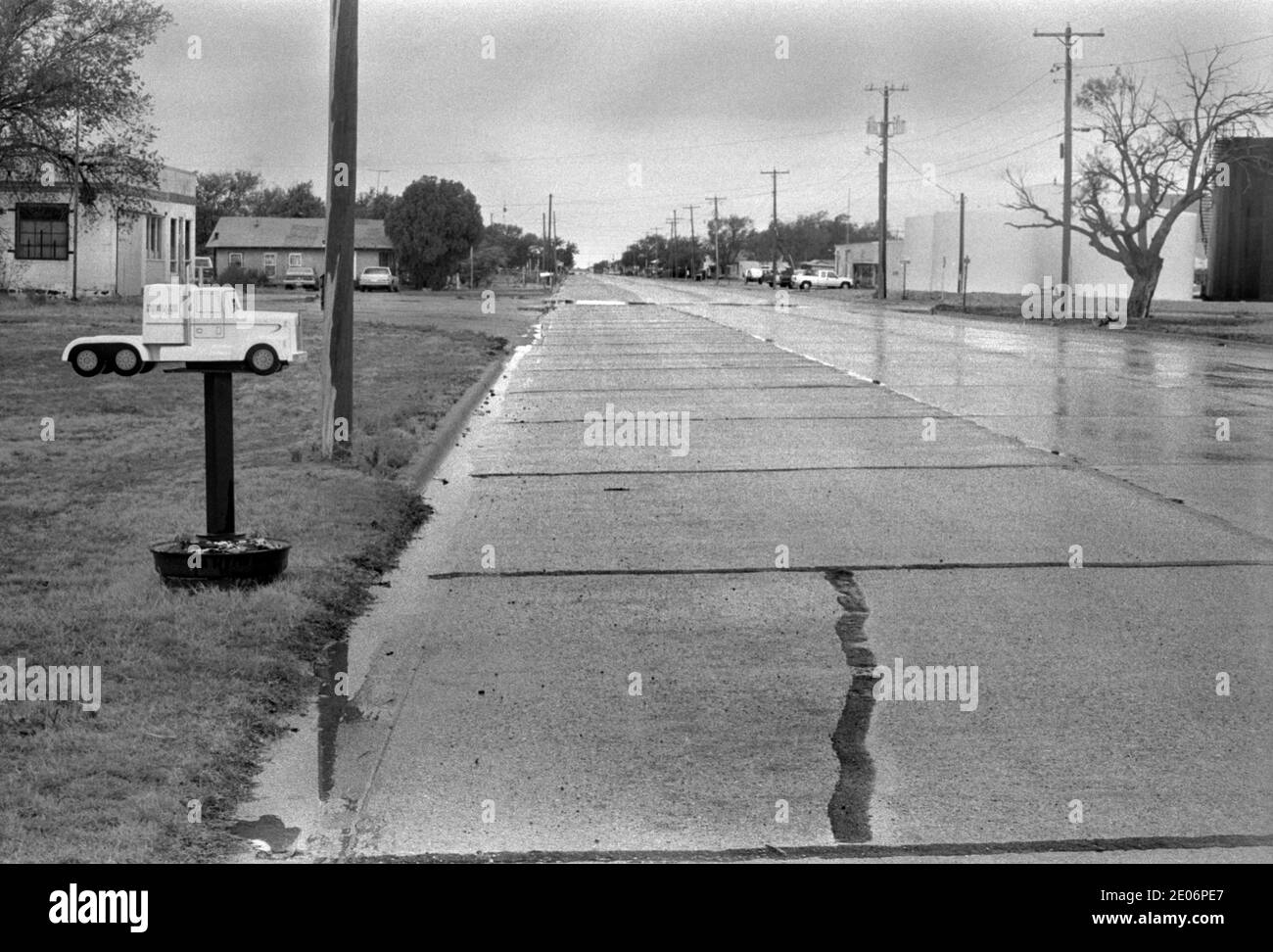 Mailbox besides a suburban street Big Spring, Texas, USA 1999.  Its in the shape of a long distance truck, a truck drivers front garden. 1990s US HOMER SYKES Stock Photo