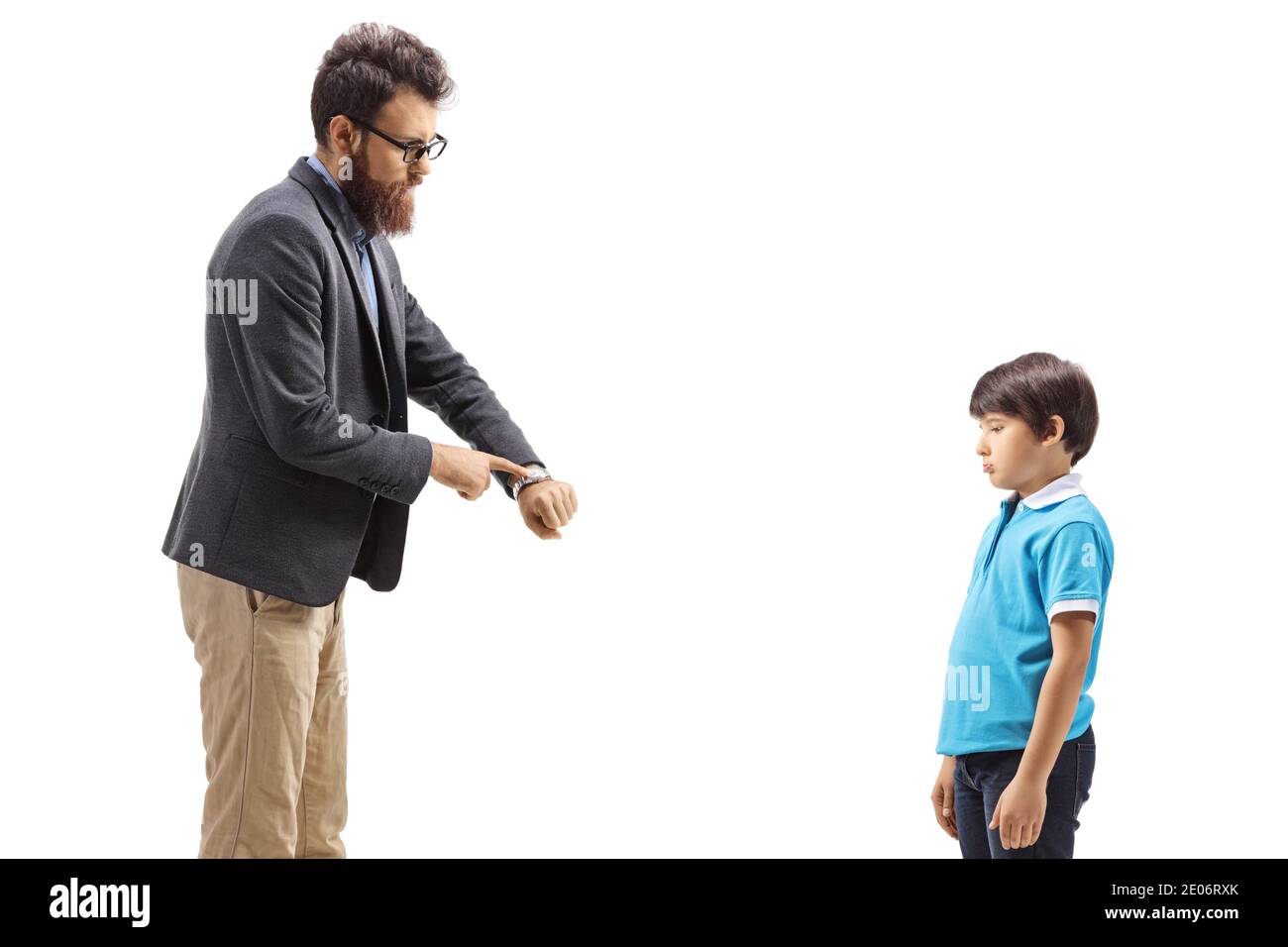 Father scolding his son and pointing at this watch isolated on white background Stock Photo