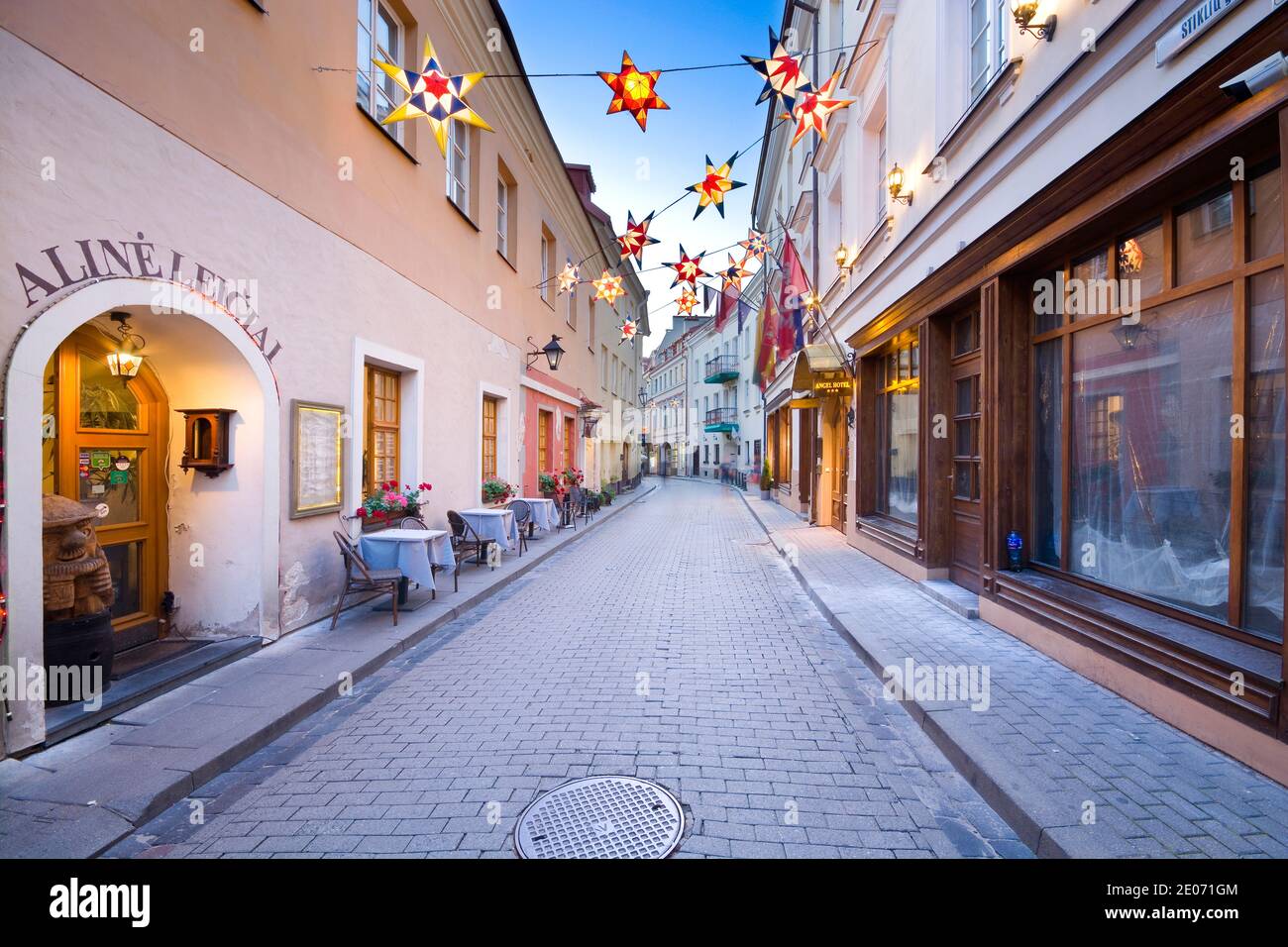 Night view of illuminated Stikliai Street in Jewish quarter of the Old Town of Vilnius, Lithuania. Stock Photo
