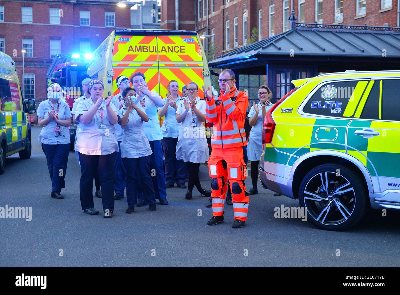 Emergency Service workers from Leicester gather at Leicester Royal Infirmary to applaud the NHS staff during clap for carers Stock Photo