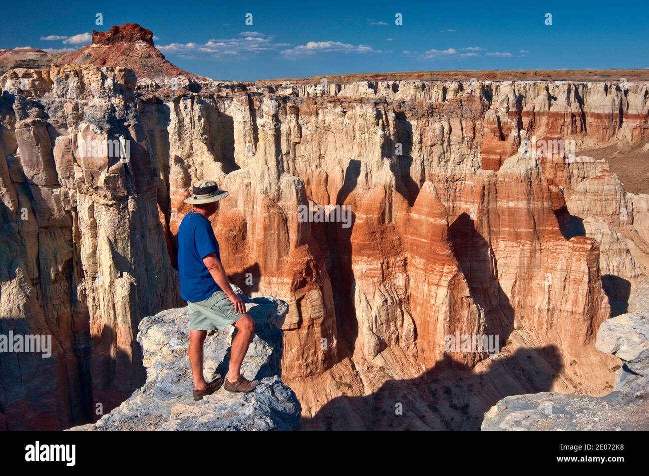 Hiker over Coal Mine Canyon at Coal Mine Mesa, Moenkopi Plateau, on