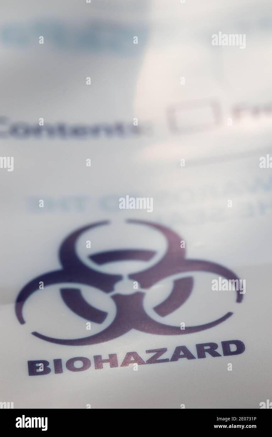 A blue biohazard symbol on a plastic bag Stock Photo