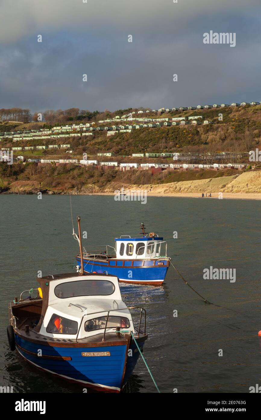 Boats moored at the harbour at Pettycur Bay, Kinghorn, Fife, Scotland. Stock Photo