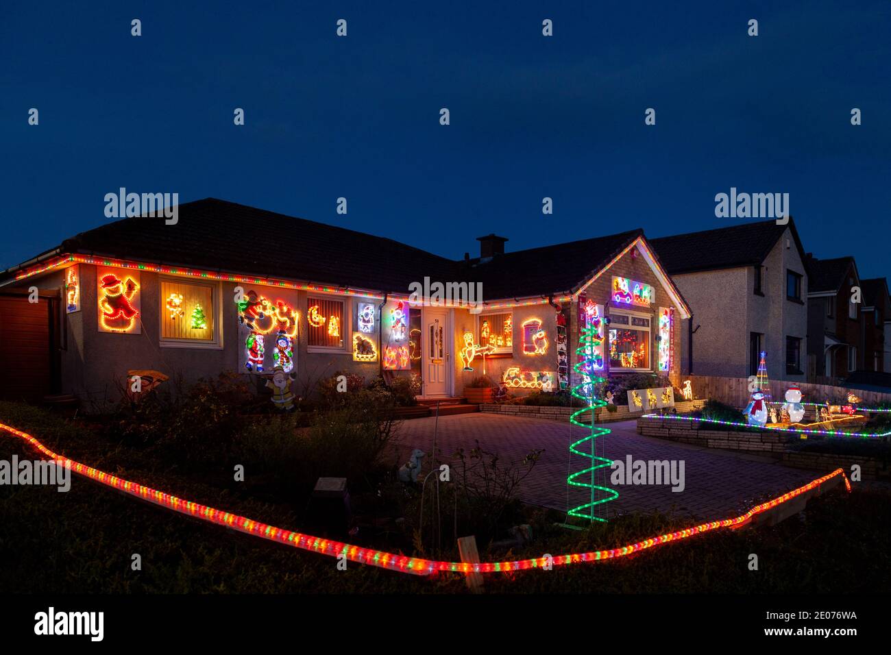 House in Kirkcaldy Fife with abundant exterior Christmas lights Stock