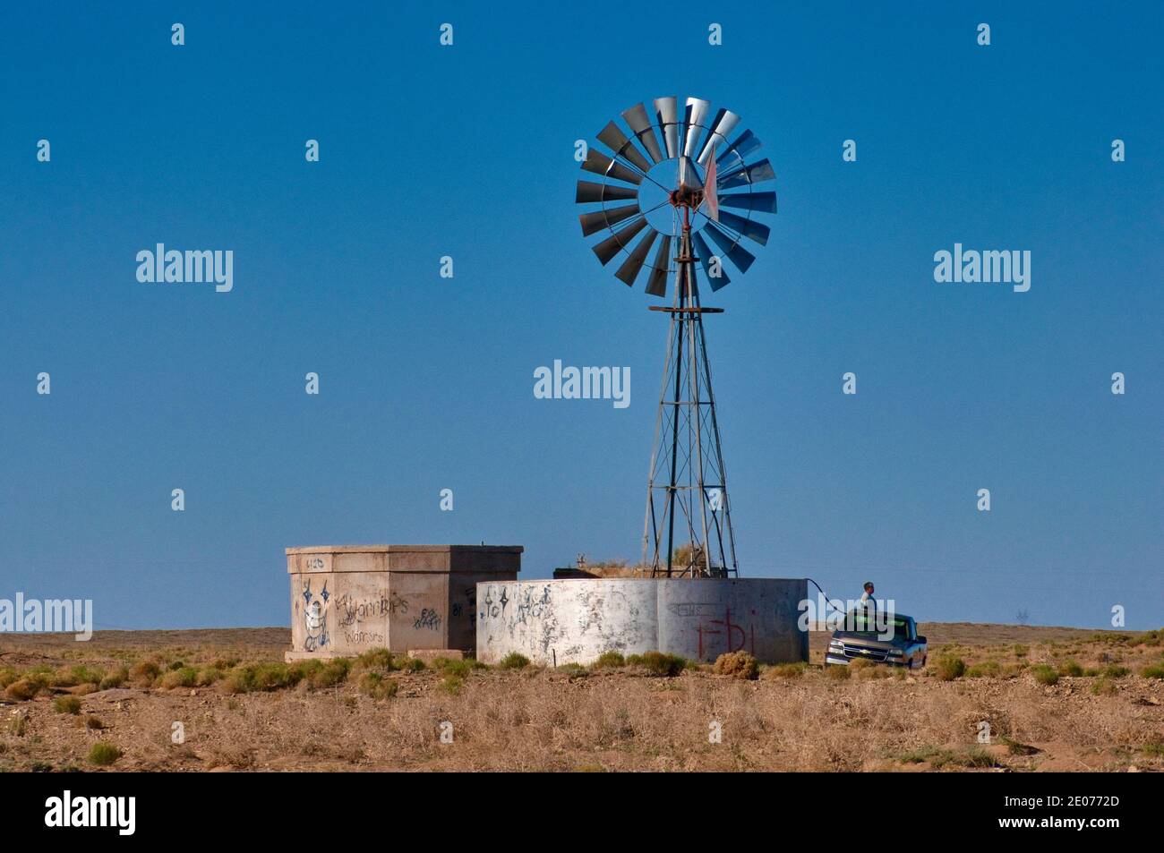 Windmill and water tank near Coal Mine Canyon, Moenkopi Plateau, Navajo