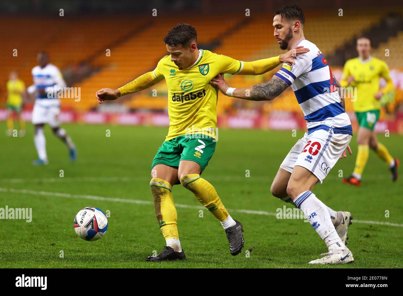Max Aarons of Norwich City and Geoff Cameron of Queens Park Rangers in action - Norwich City v Queens Park Rangers, Sky Bet Championship, Carrow Road, Norwich, UK - 29th December 2020  Editorial Use Only - DataCo restrictions apply Stock Photo