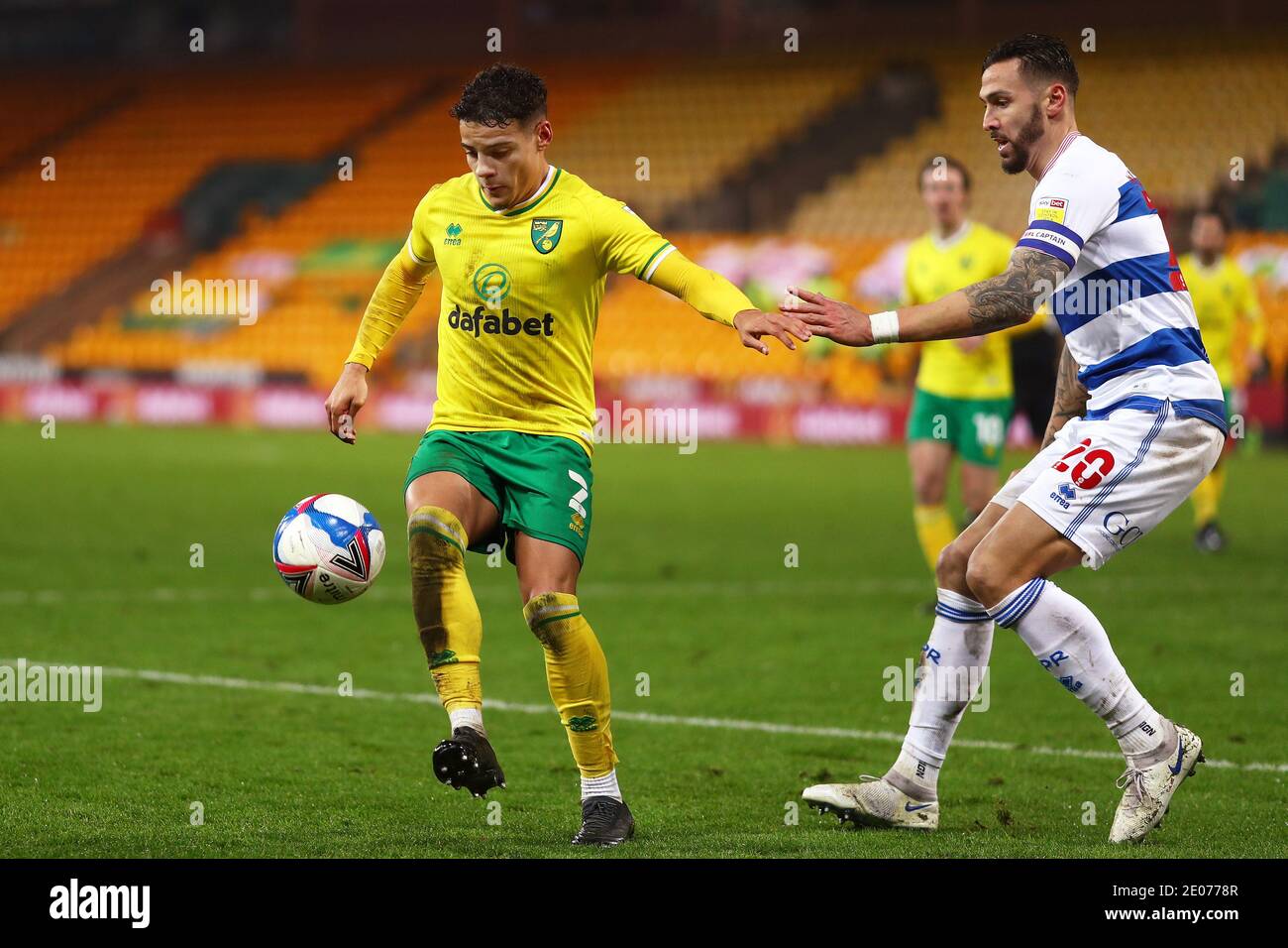Max Aarons of Norwich City and Geoff Cameron of Queens Park Rangers in action - Norwich City v Queens Park Rangers, Sky Bet Championship, Carrow Road, Norwich, UK - 29th December 2020  Editorial Use Only - DataCo restrictions apply Stock Photo