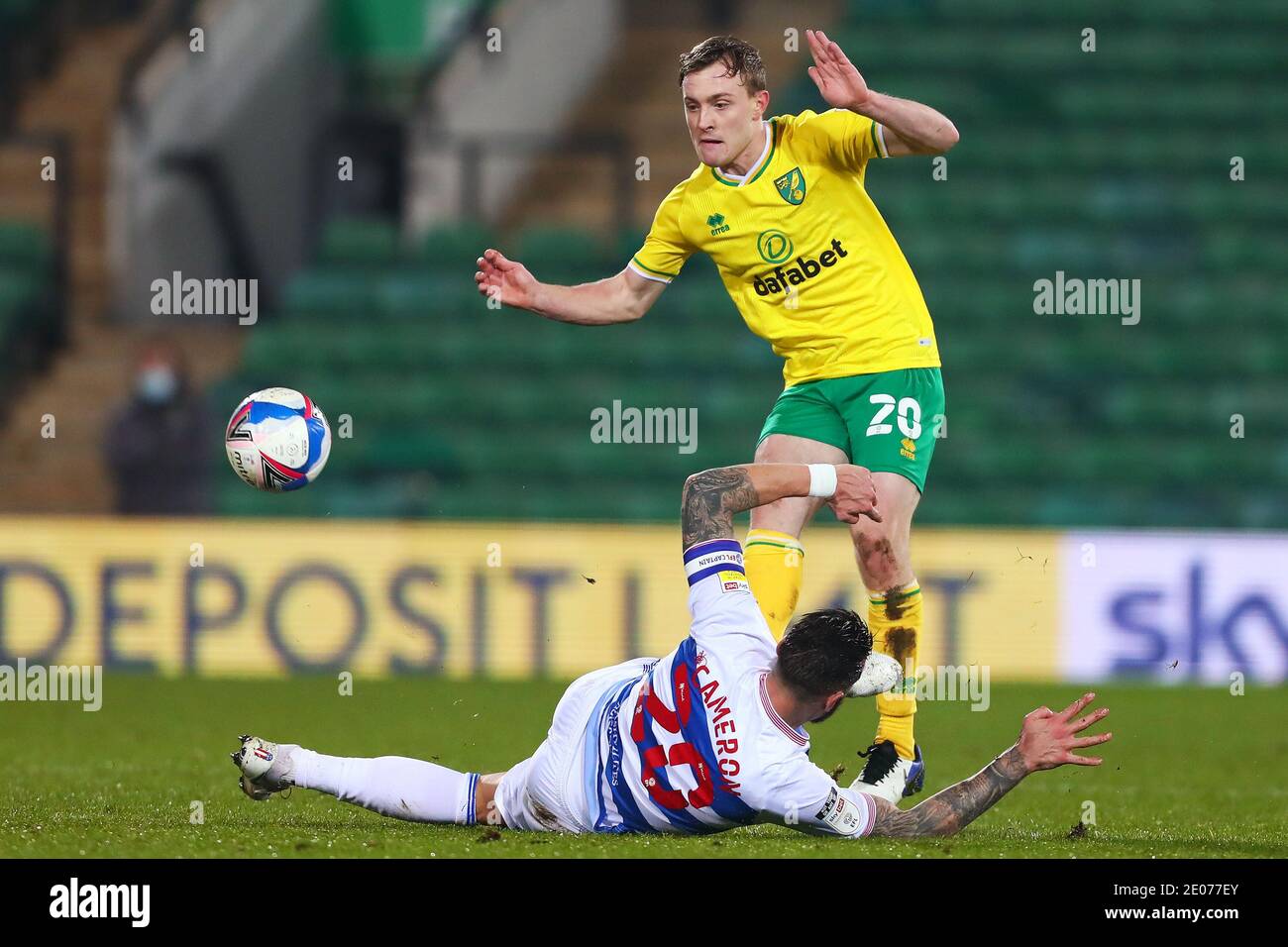 Oliver Skipp of Norwich City and Geoff Cameron of Queens Park Rangers in action - Norwich City v Queens Park Rangers, Sky Bet Championship, Carrow Road, Norwich, UK - 29th December 2020  Editorial Use Only - DataCo restrictions apply Stock Photo