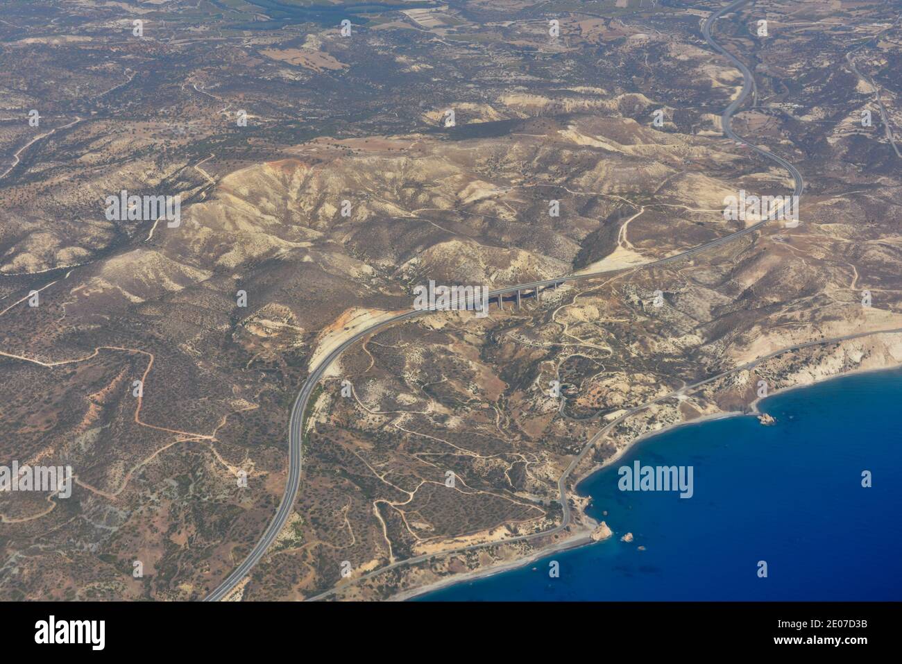 Aerial view over Cyprus Aphrodite hills, beach, rock, in Limassol district with A6 highway and coastal B6 road along Mediterranean sea Stock Photo