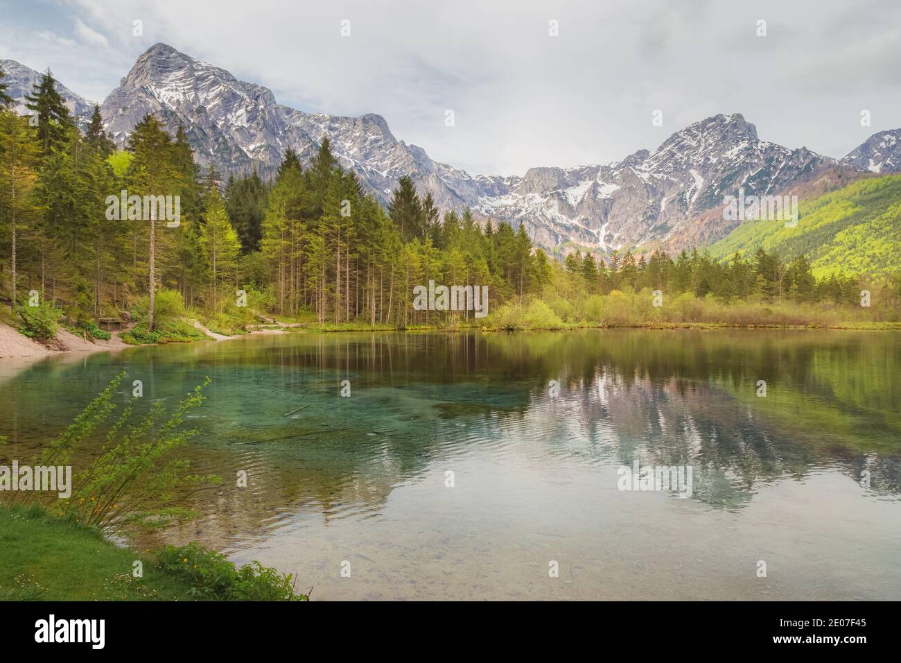 A calm day at Lake Almsee in Upper Austria's part of the Salzkammergut ...