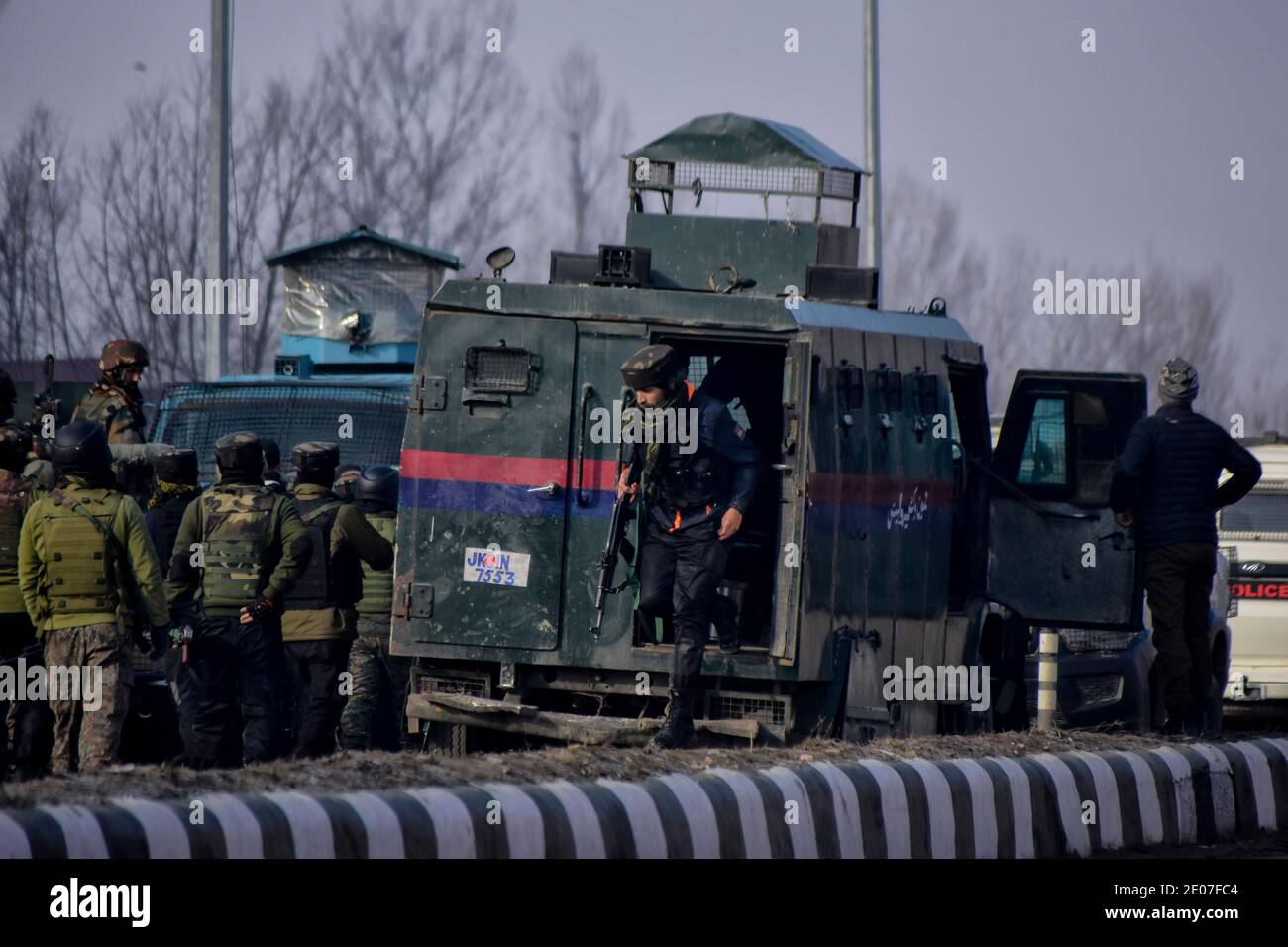 December 30, 2020: Indian forces arrive near an encounter site during an encounter with Millitants in HMT area of Srinagar, Indian Administered Kashmir on 30 December2020. Three millitants were killed in an overnight encounter with Indian Forces. Credit: Muzamil Mattoo/IMAGESLIVE/ZUMA Wire/Alamy Live News Stock Photo