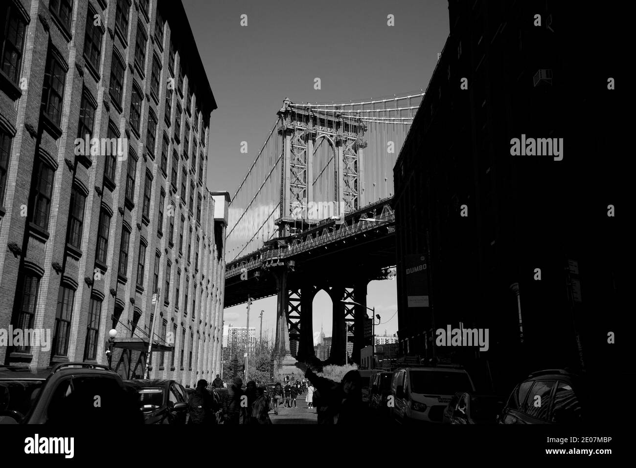 The Manhattan Bridge: Suspension bridge over the East River in New York City, connecting Lower Manhattan and Downtown Brooklyn, DUMBO. Black and white Stock Photo