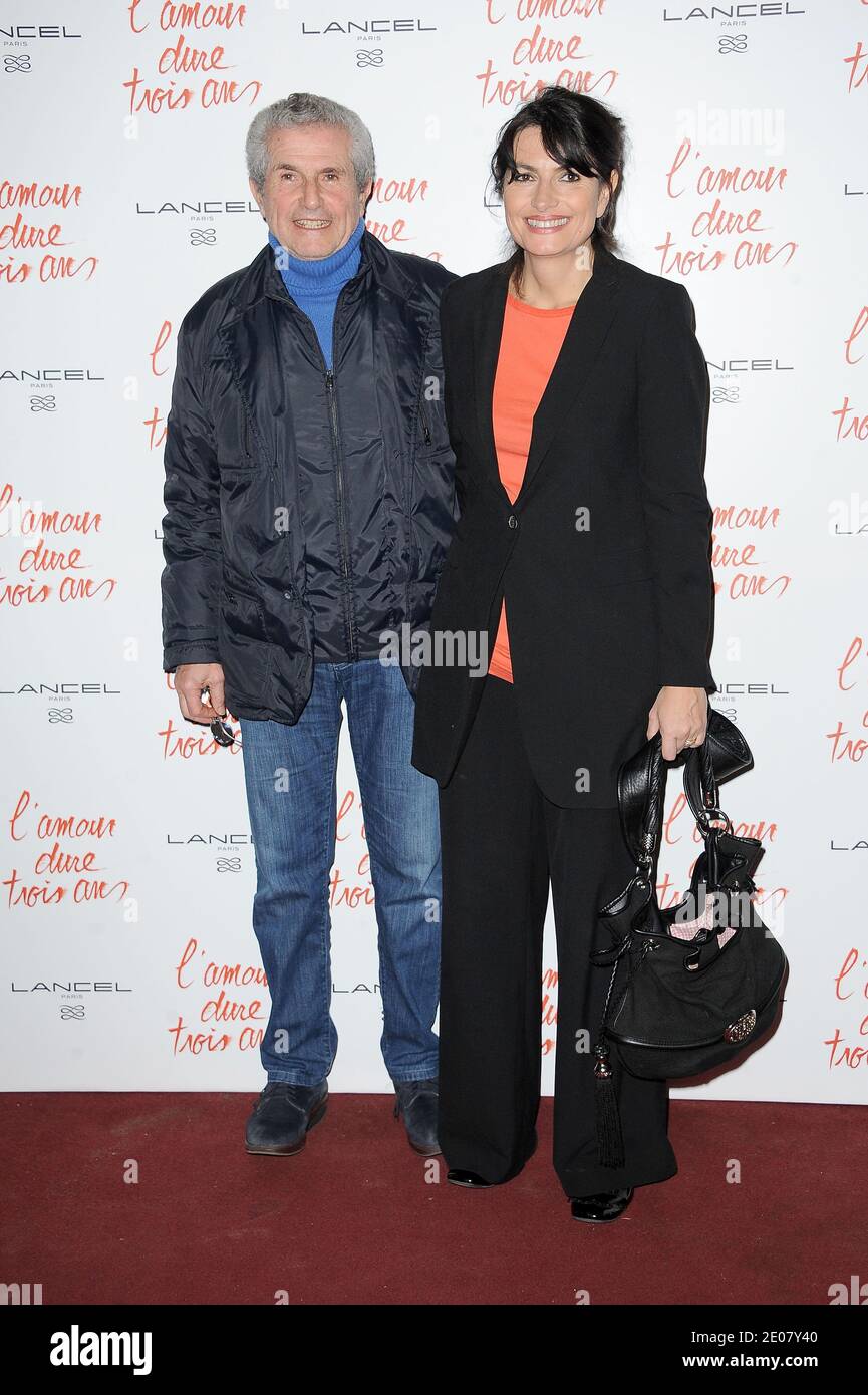 Claude Lelouch and Valerie Perrin attending the premiere of the movie  'L'Amour dure Trois Ans