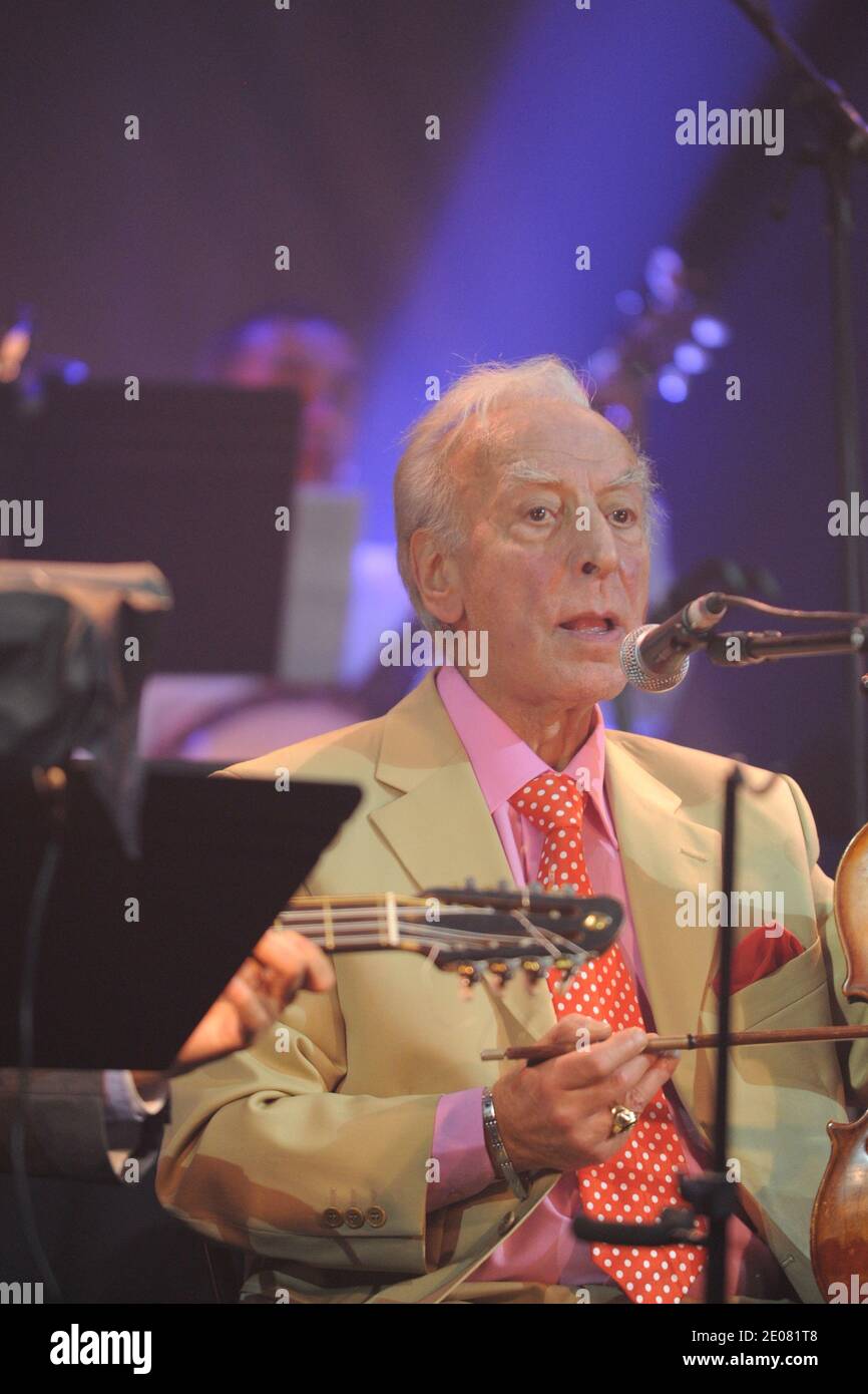 French famous 'pied noir' actor Robert Castel plays with the 'El Gusto' orchestra of chaabi music at the 'Grand Rex' theatre on January 9 and 10, 2012. 'El Gusto' used to be an orchestra playing in Algeria in the 1950s, and got reunited recently after a documentary movie on them. Photo by Ammar Abd Rabbo/ABACAPRESS.COM Stock Photo