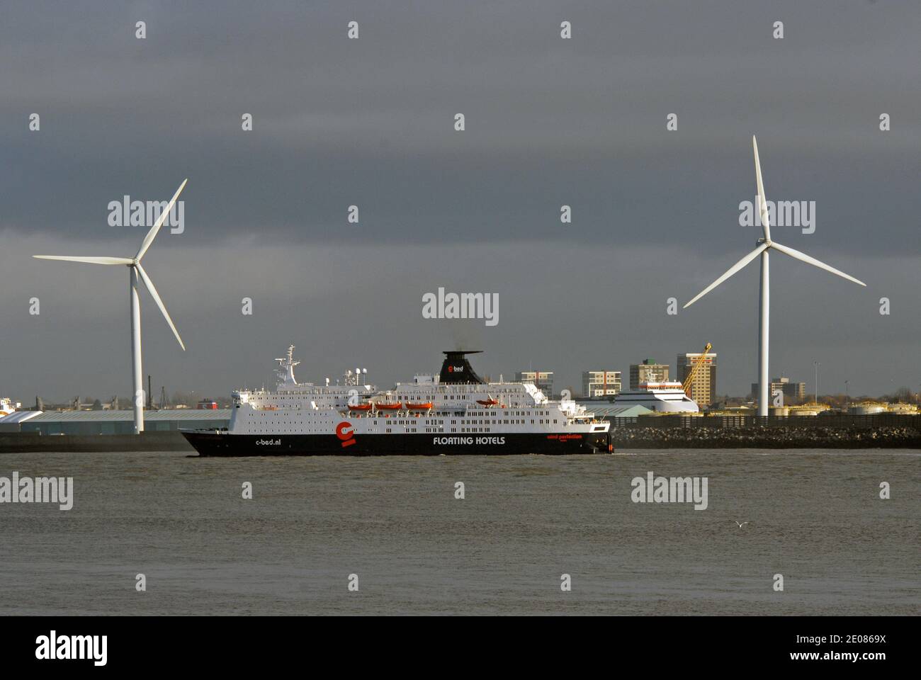 WIND PERFECTION, C-BED Floating Hotels largest accommodation ship, departs from LIVERPOOL outward for the WEST OF DUDDON SANDS WIND FARM, IRISH SEA. Stock Photo
