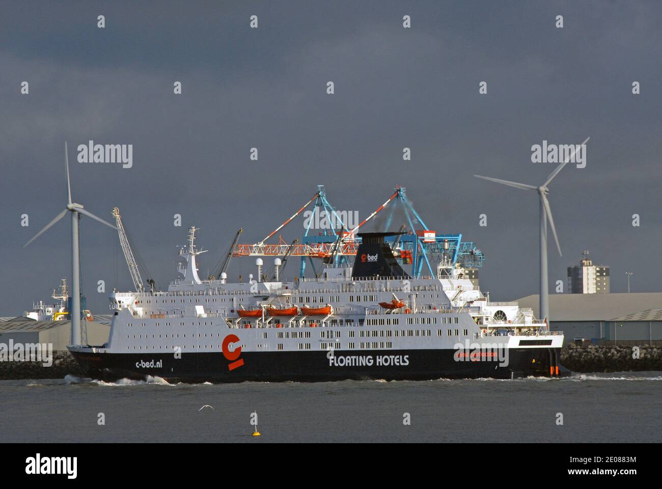 WIND PERFECTION, C-BED Floating Hotels largest accommodation ship, departs from LIVERPOOL outward for the WEST OF DUDDON SANDS WIND FARM, IRISH SEA. Stock Photo