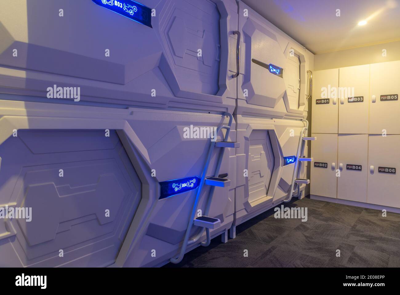 Futuristic pod hostel offering limited space Stock Photo