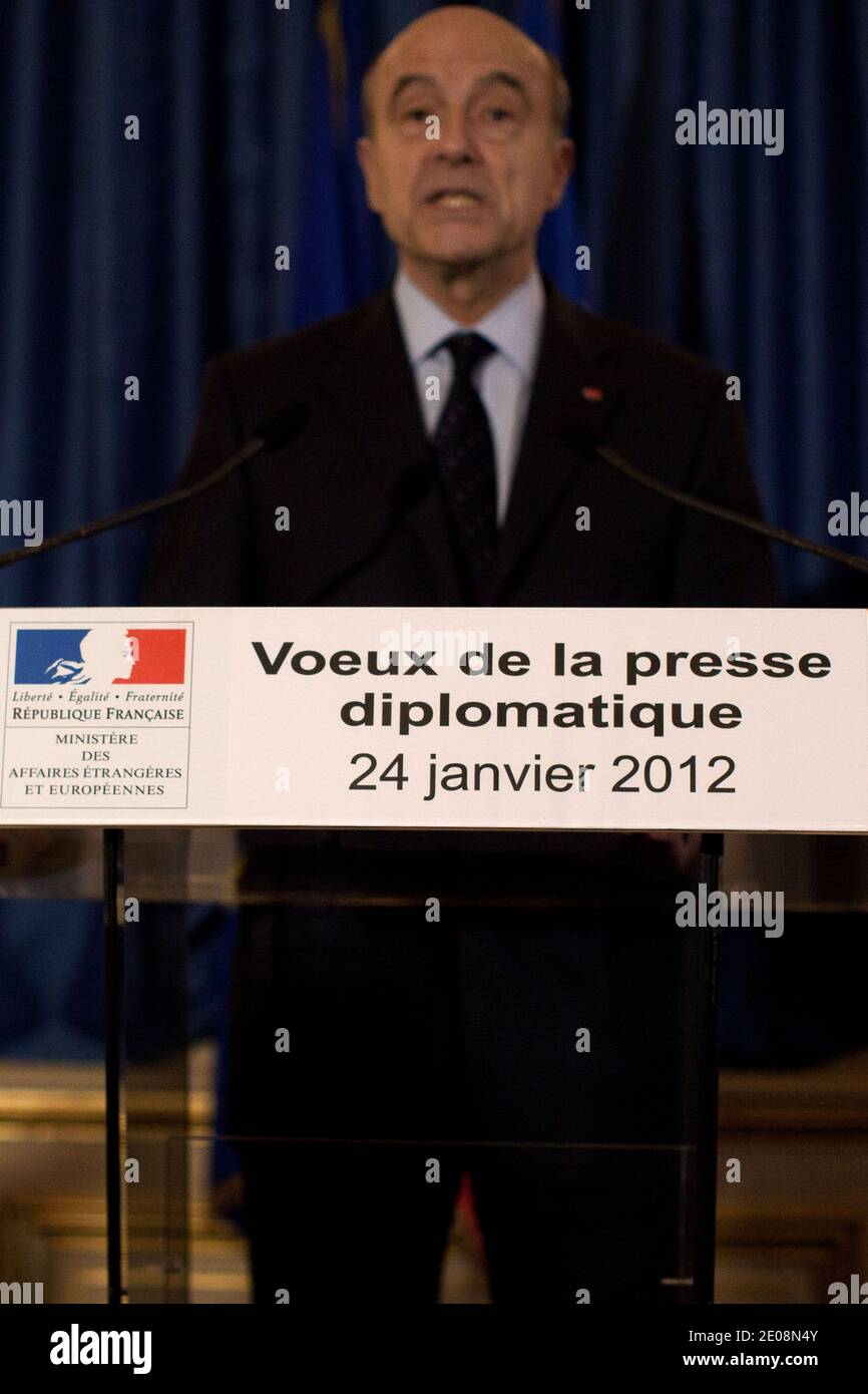 French Foreign Affairs Minister Alain Juppe delivers wishes to the ...