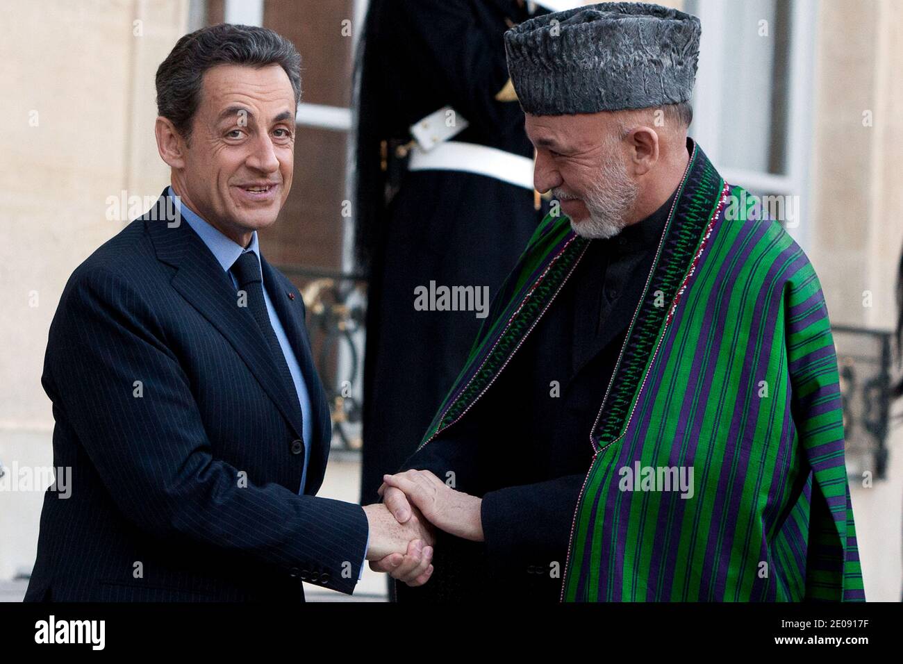 French President Nicolas Sarkozy welcomes his Afghan counterpart Hamid Karzai at the Elysee Palace, in Paris, France on January 27, 2012. Photo by Stephane Lemouton/ABACAPRESS.COM Stock Photo
