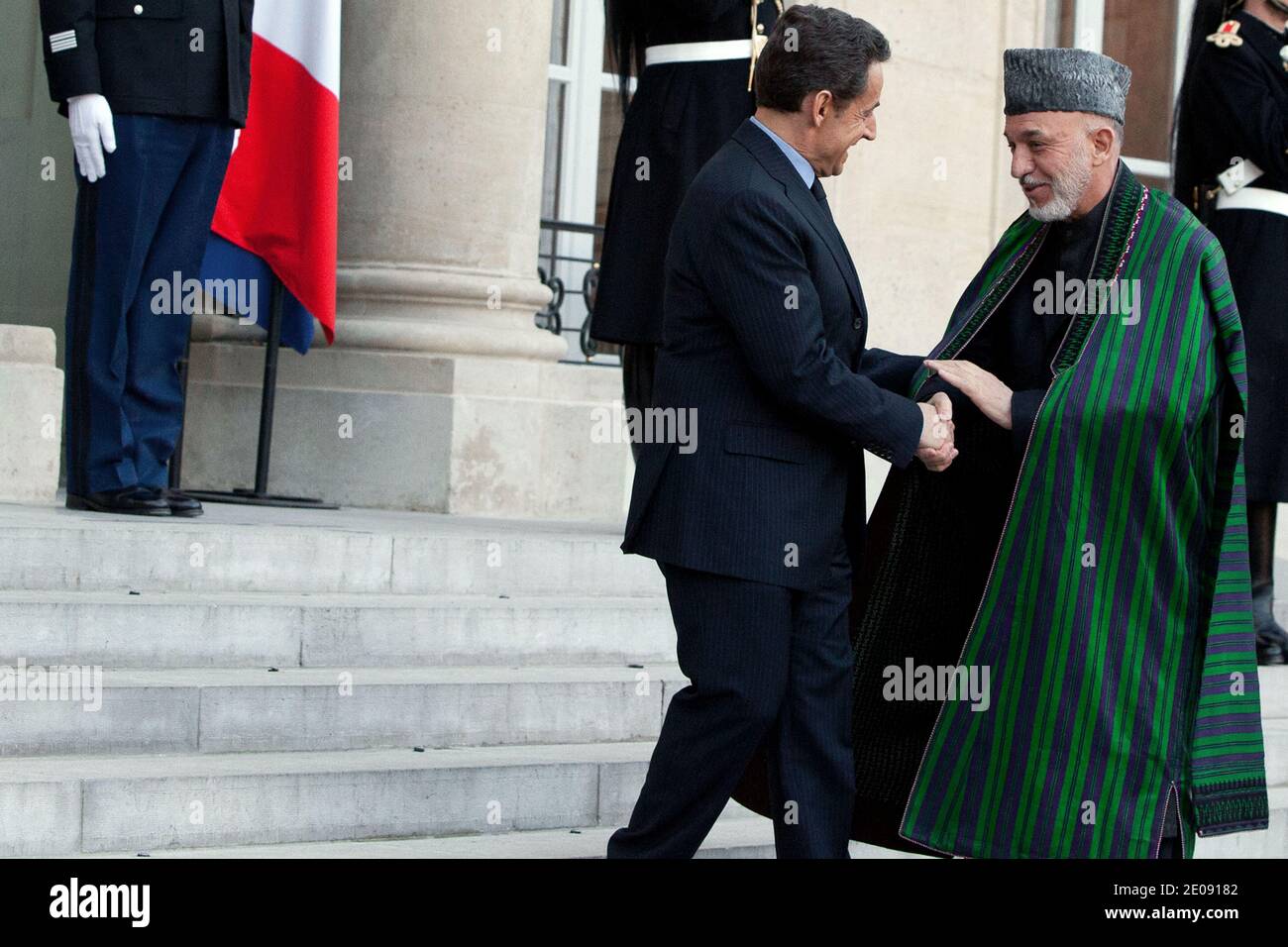 French President Nicolas Sarkozy welcomes his Afghan counterpart Hamid Karzai at the Elysee Palace, in Paris, France on January 27, 2012. Photo by Stephane Lemouton/ABACAPRESS.COM Stock Photo